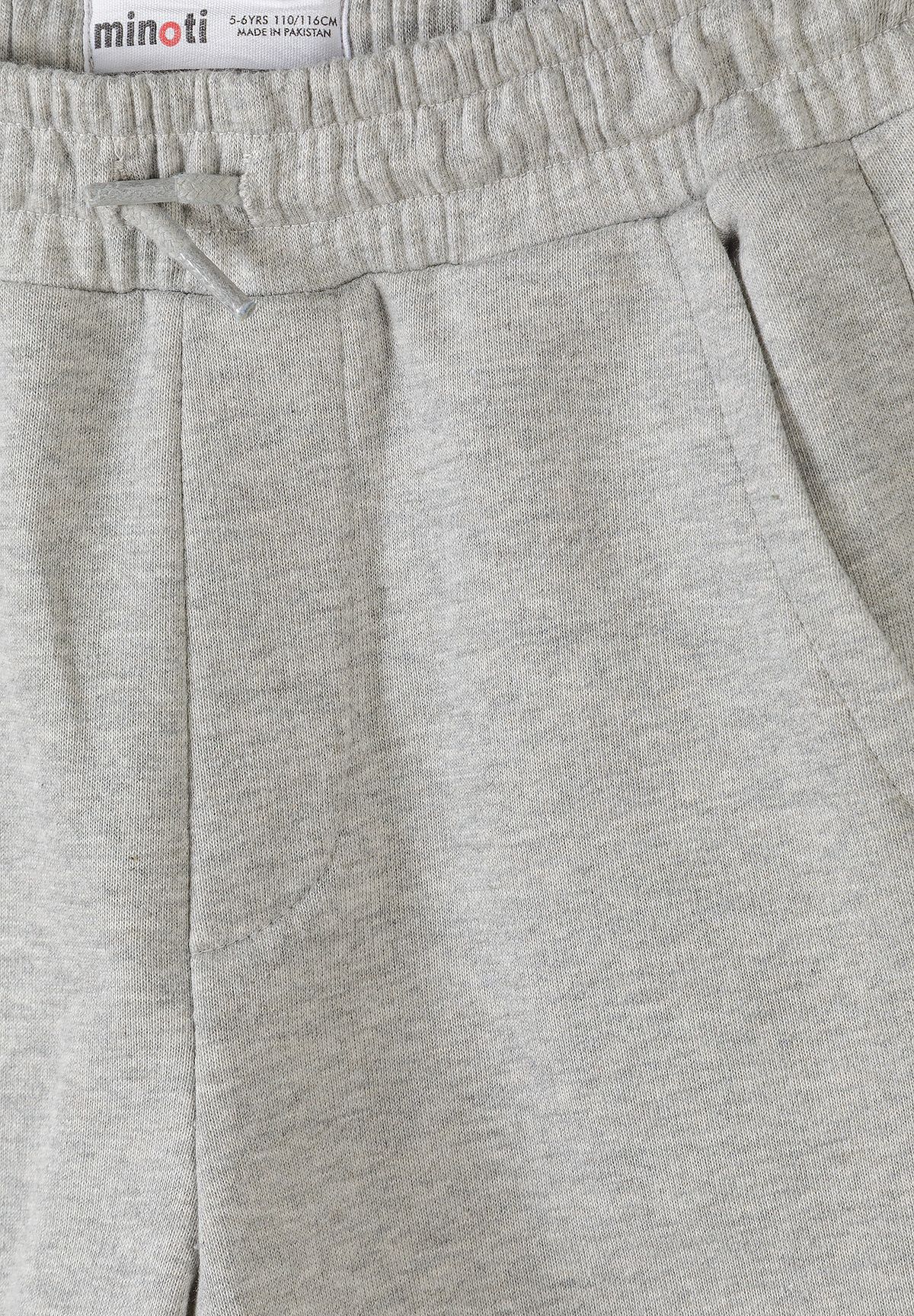 Close-up of grey marl shorts' gathered waist, small drawcord and stitched faux fly.