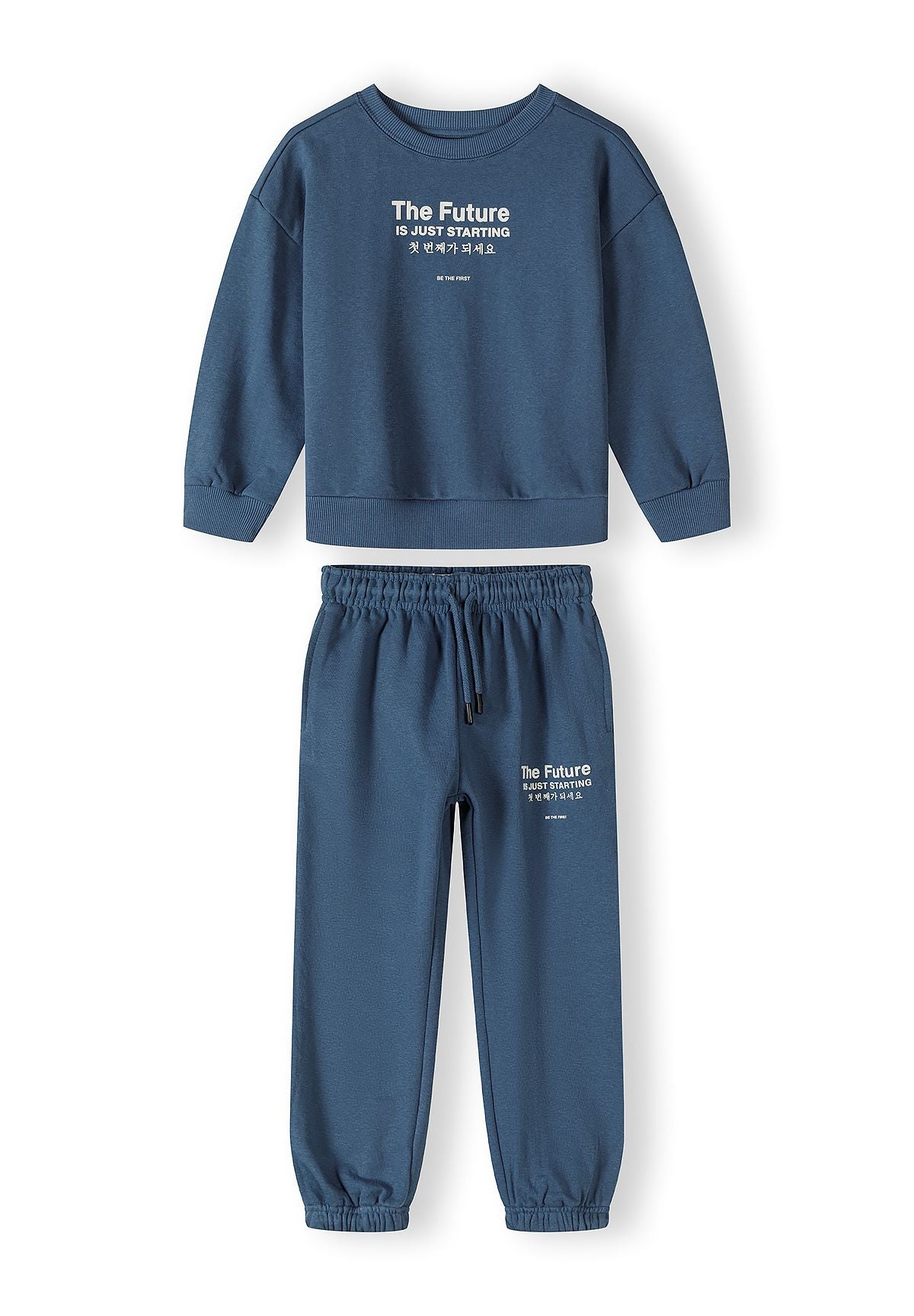 Boys blue two-piece tracksuit, zip-up sweatshirt with long sleeves and matching trousers with pockets.