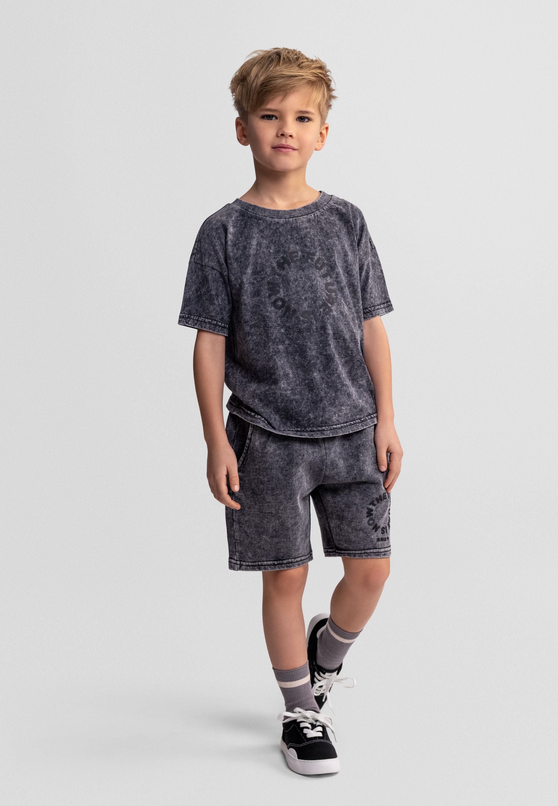 Boys grey acid wash t-shirt and shorts set, front view, featuring a ribbed crew neck and elasticated waistband.