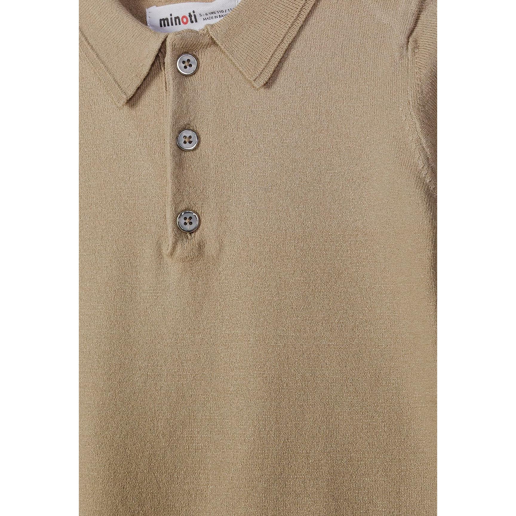 Close-up detail of stone polo shirt showing Minoti label, collar construction and button placket with three buttons