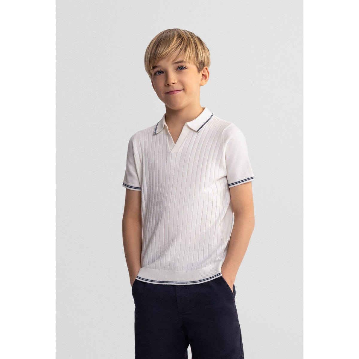 Boys' ribbed knitted polo shirt in white — complete product view for square Shop card