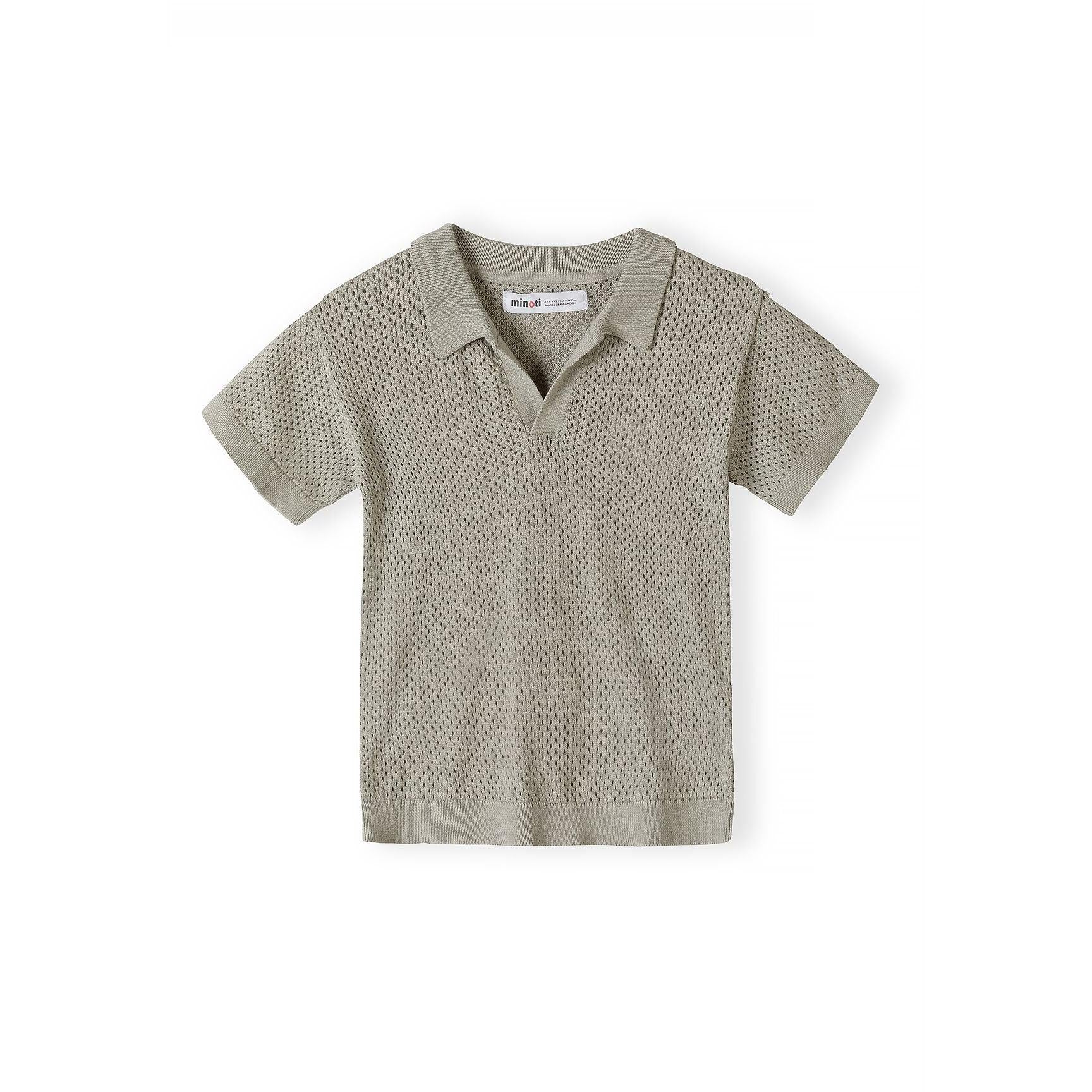 Close-up detail of khaki knitted shorts waistband showing textured mesh pattern fabric and drawstring tie on white background