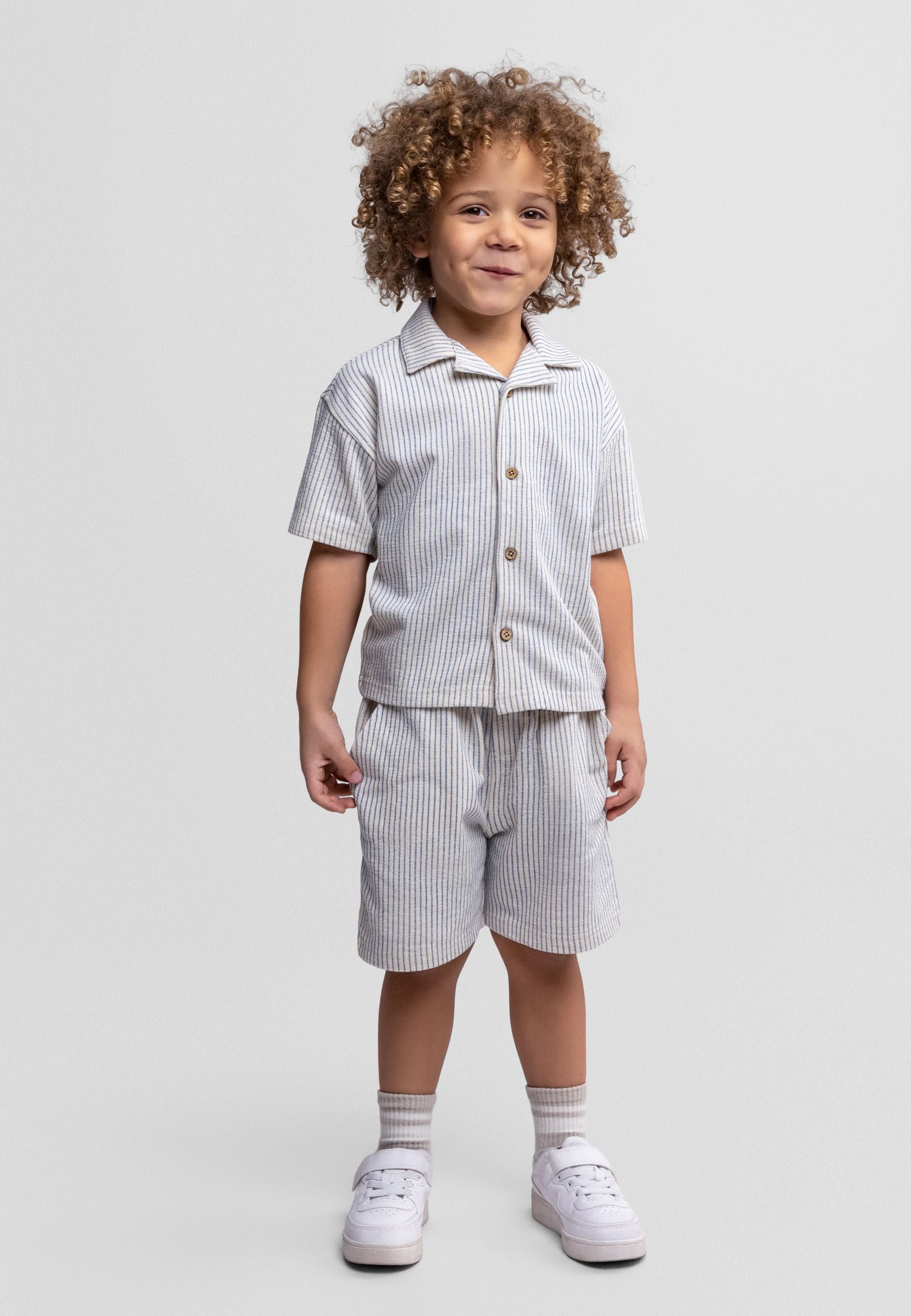 Boys striped shirt and shorts set, front view, featuring buttons and elasticated waist.
