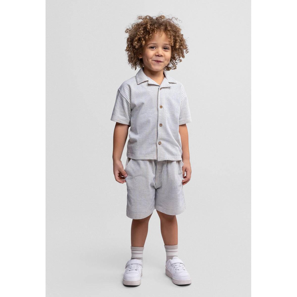 Boys' striped shirt and shorts set in cream and blue — complete product view for square Shop card