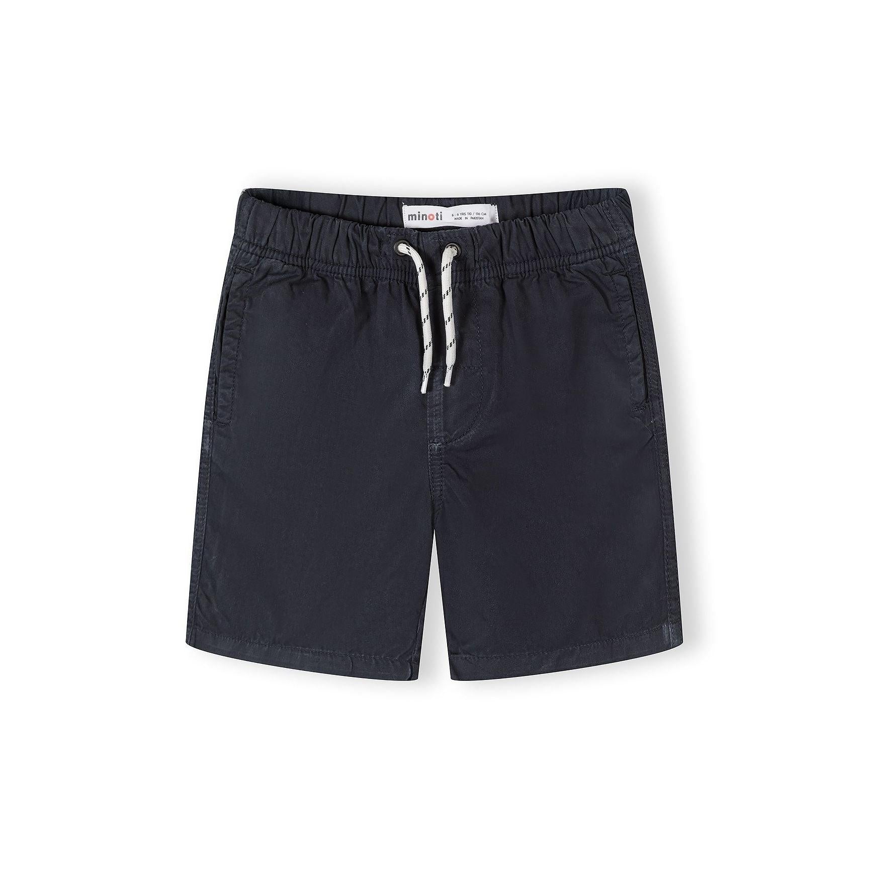 Close-up of navy blue cotton shorts showing front view with elastic waistband and white drawstring ties against white background