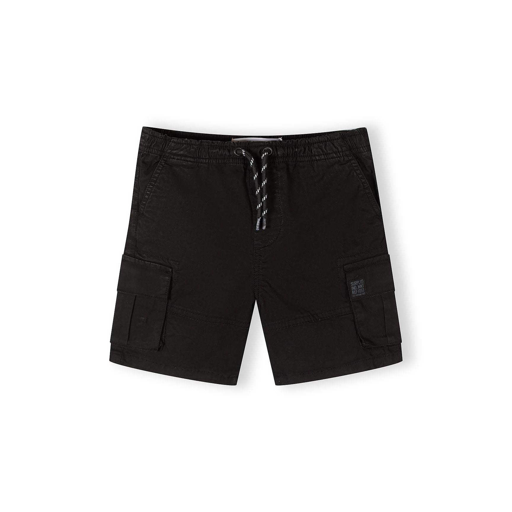 Close-up front view of black Minoti combat shorts on white background showing cargo pockets, drawstring waist and structured fit