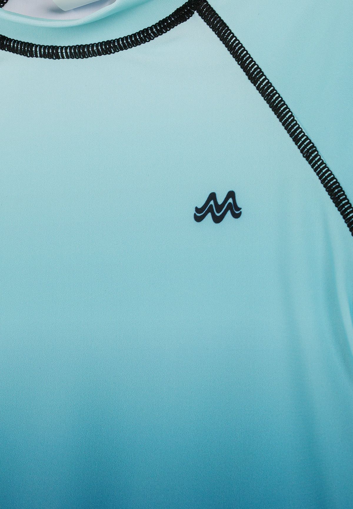 Close-up of a boys' turquoise rash vest with black stitching and logo.
