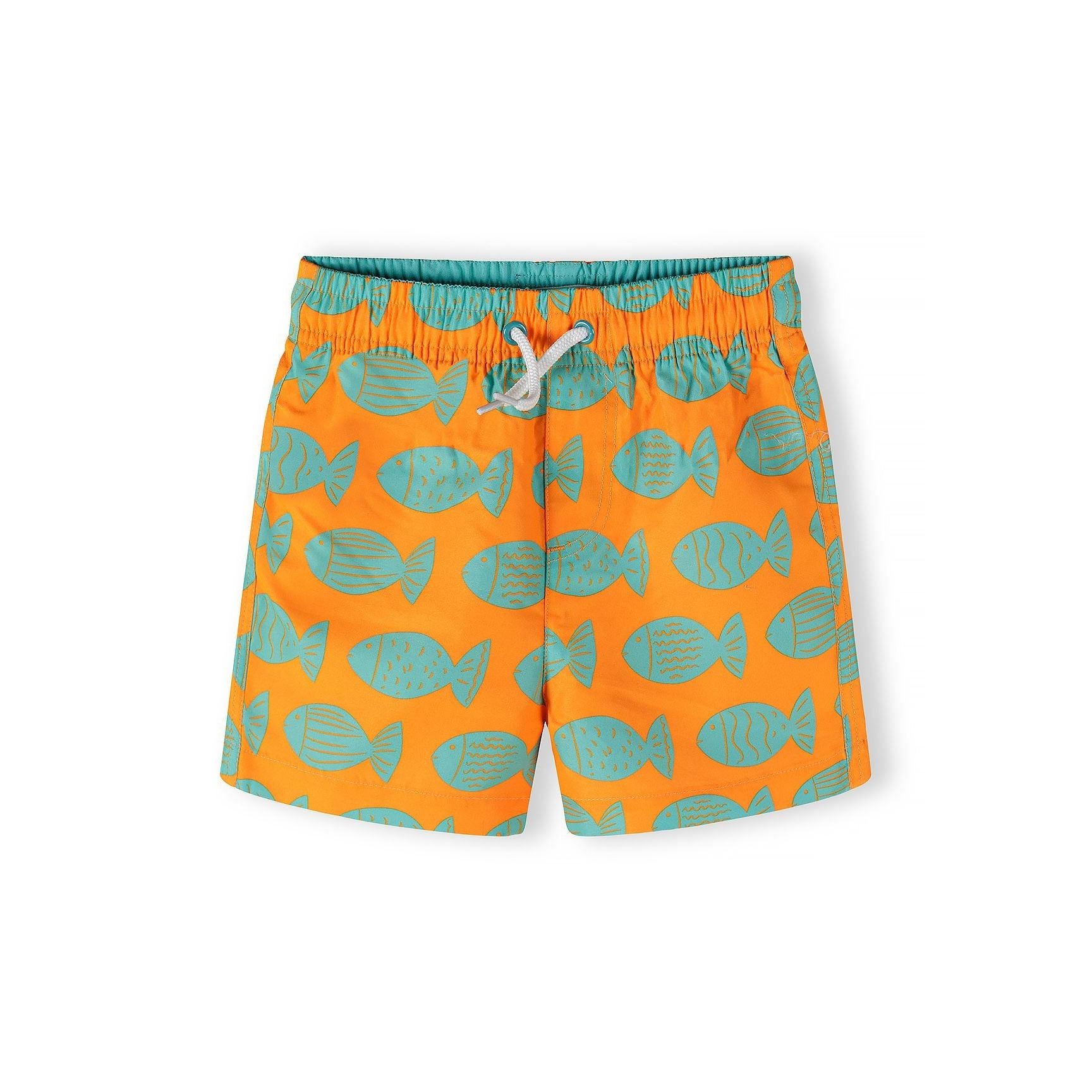 Single orange swim shorts with turquoise fish print pattern, showing elasticated waistband with white drawstring, flat lay on white background