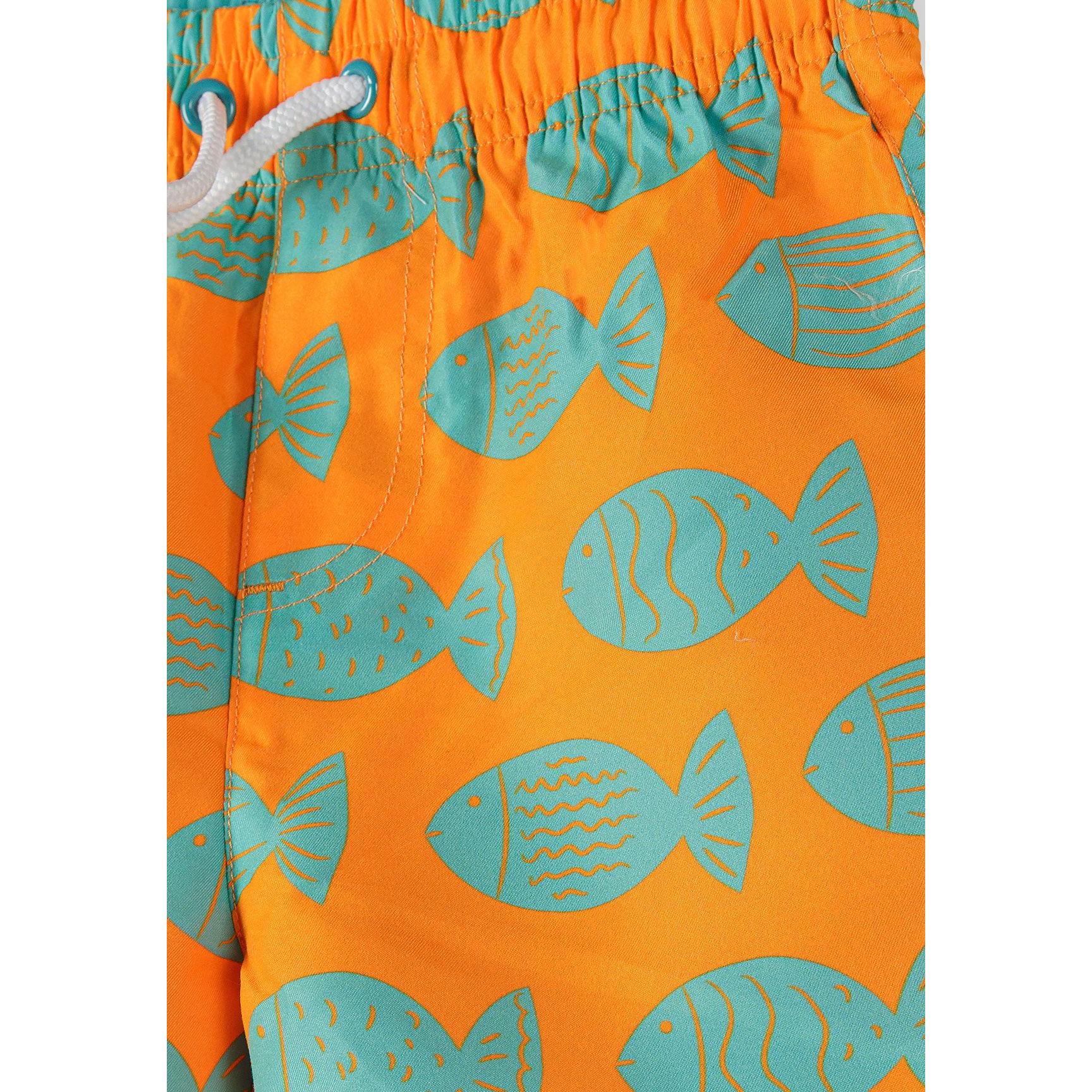 Close-up detail of orange swim shorts showing turquoise fish print pattern with various fish shapes and sizes, white drawstring visible at waistband