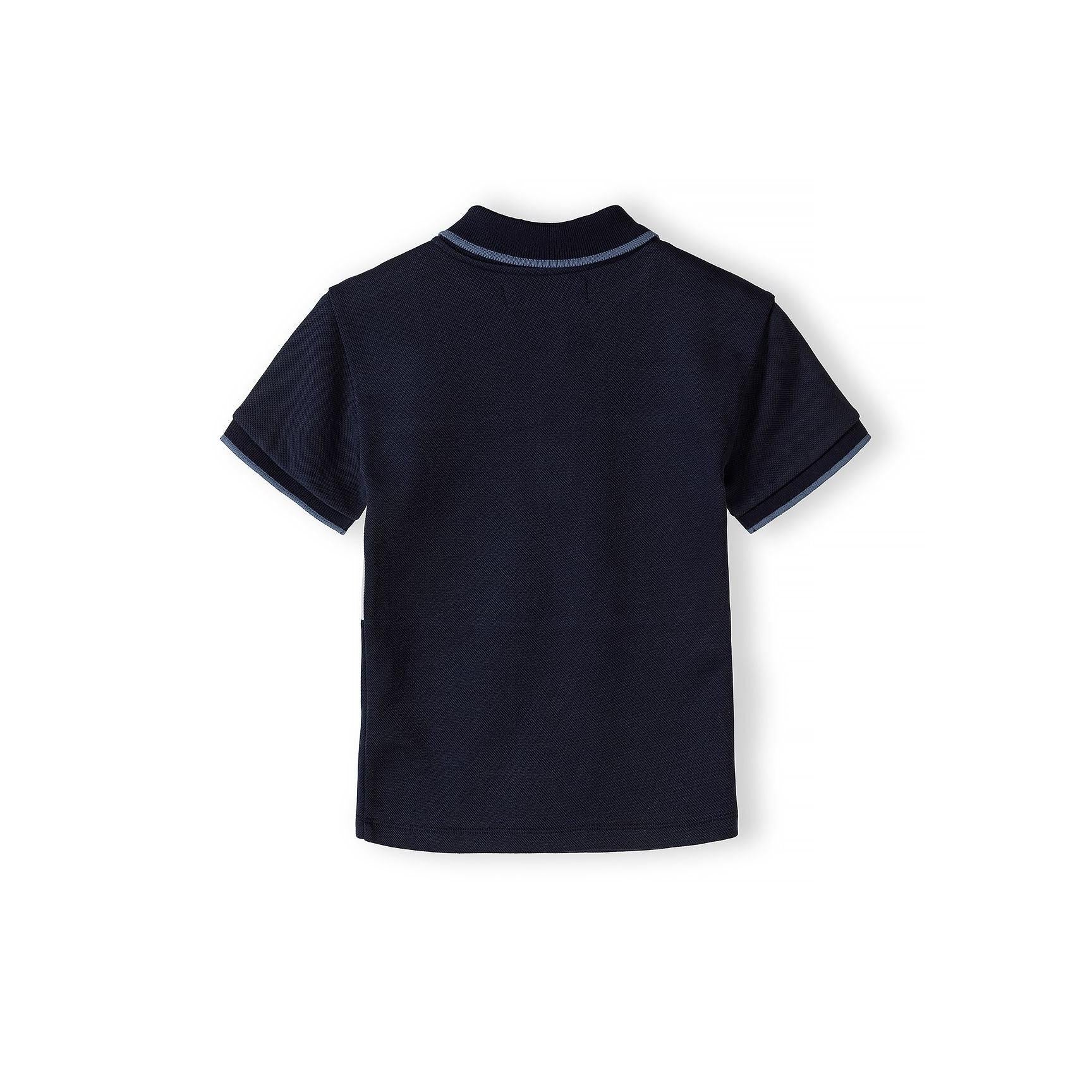 Back view of navy pique polo shirt showing solid navy colour and collar detail on white background