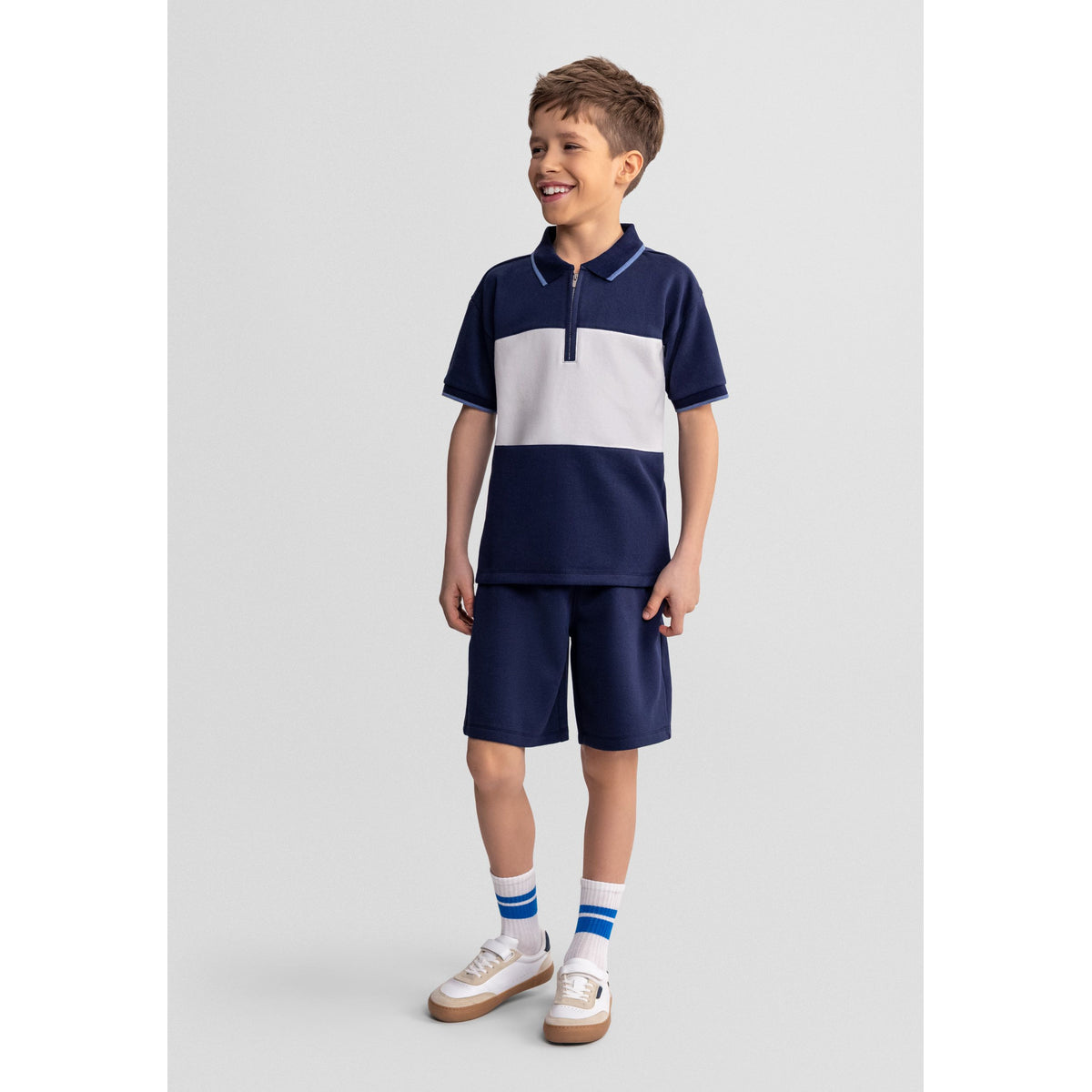 Boys' zip neck polo and shorts set in navy and white — complete product view for square Shop card