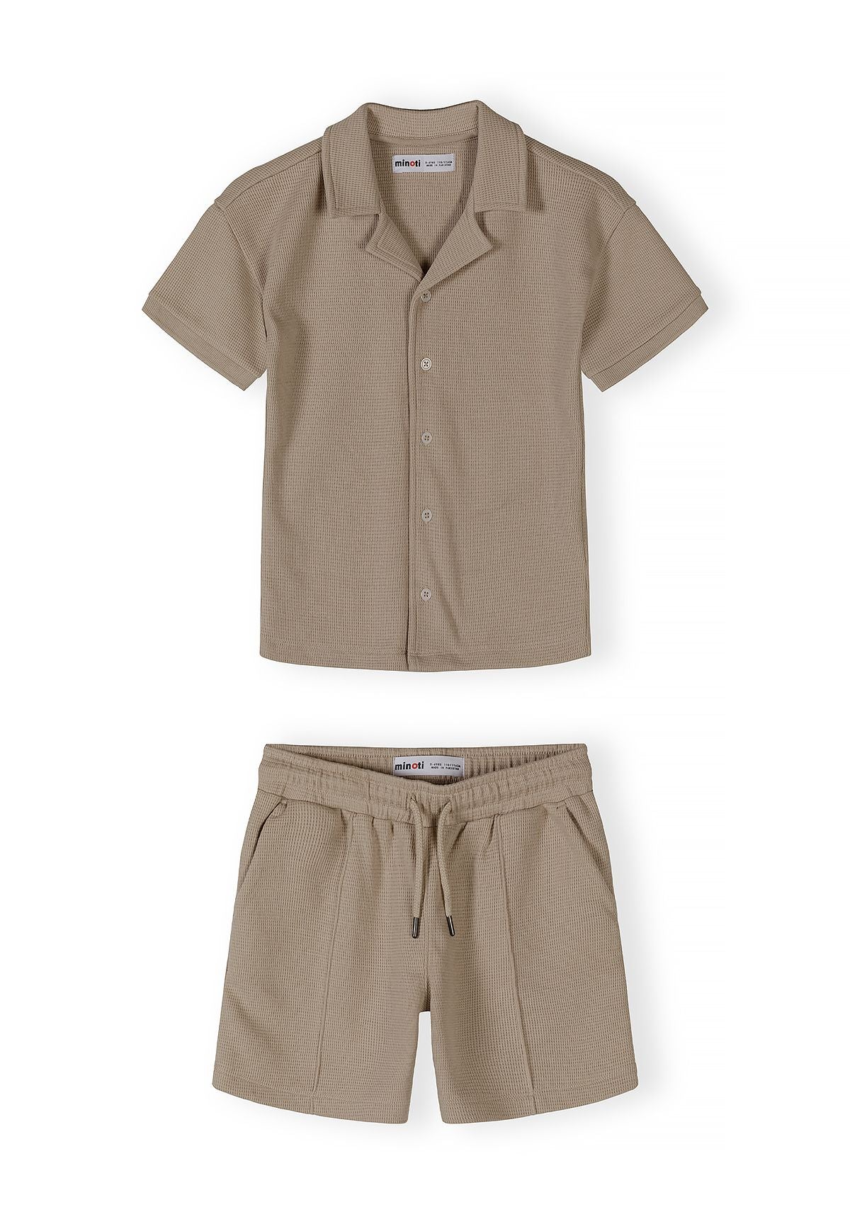 Boys cotton polo shirt and shorts set in muted sand, front view with button placket and elasticated waistband.