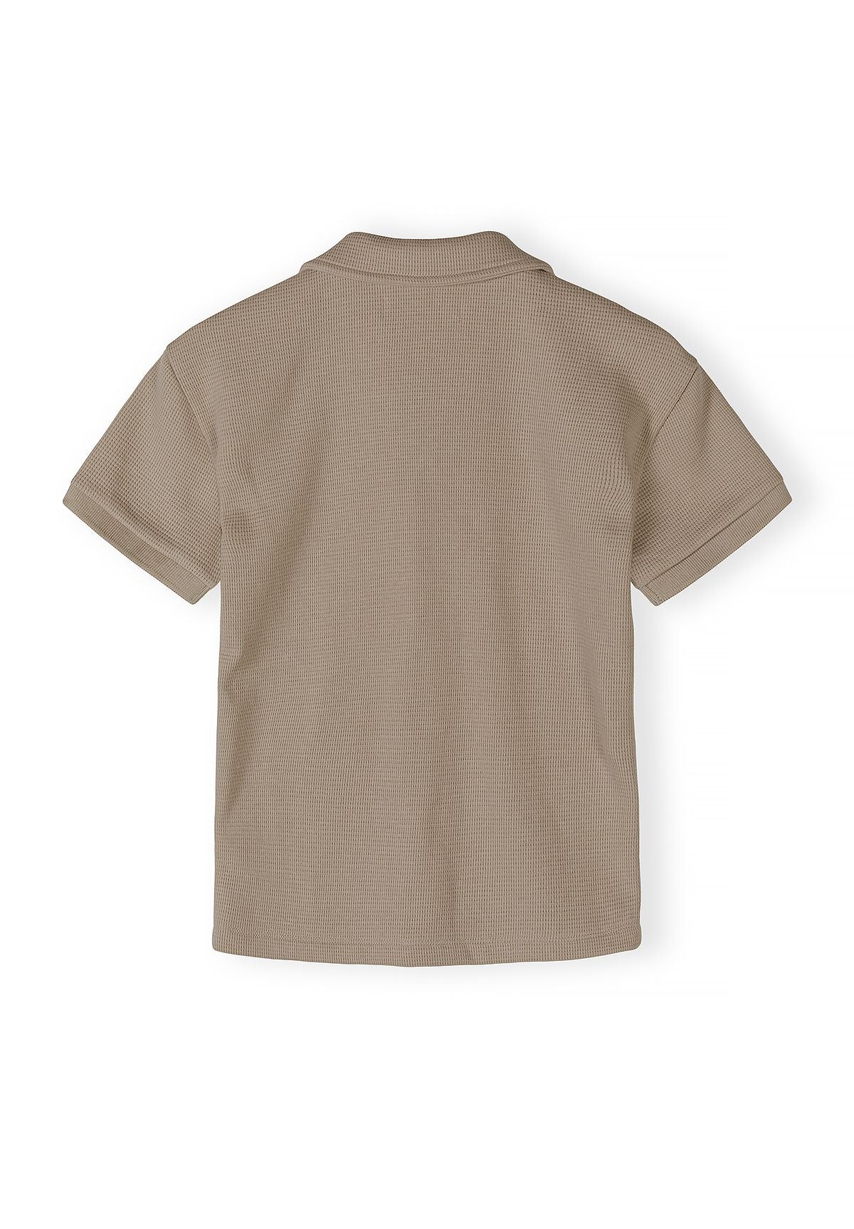 Boys polo shirt in muted sand, back view, classic collar and short sleeves.