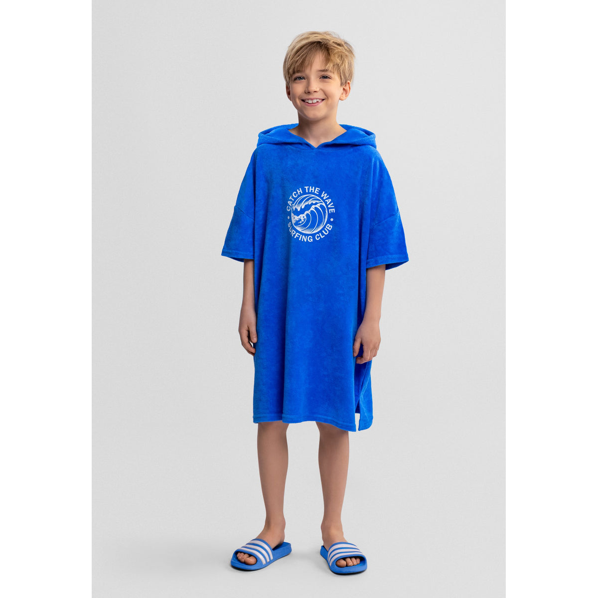 Boys' hooded towel poncho in blue — complete product view for square Shop card