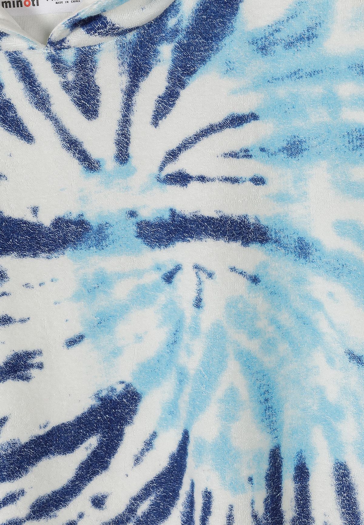Detail of boys' hooded tie-dye cover up in blue and white with short sleeves.