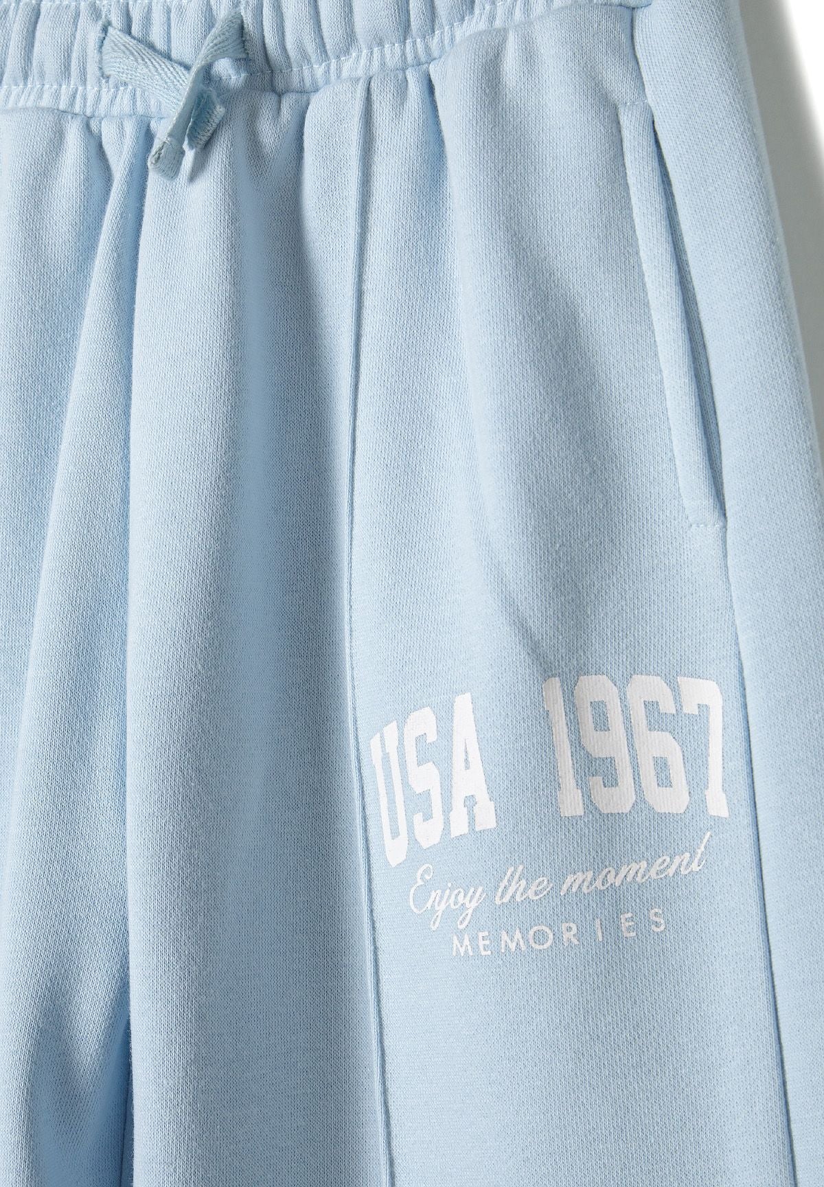 Wide leg joggers in solid blue with an elasticated waistband and side pockets.