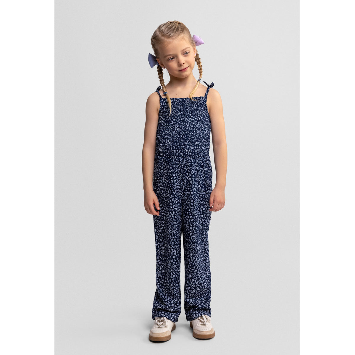 Girls' floral jumpsuit in navy and white — complete product view for square Shop card