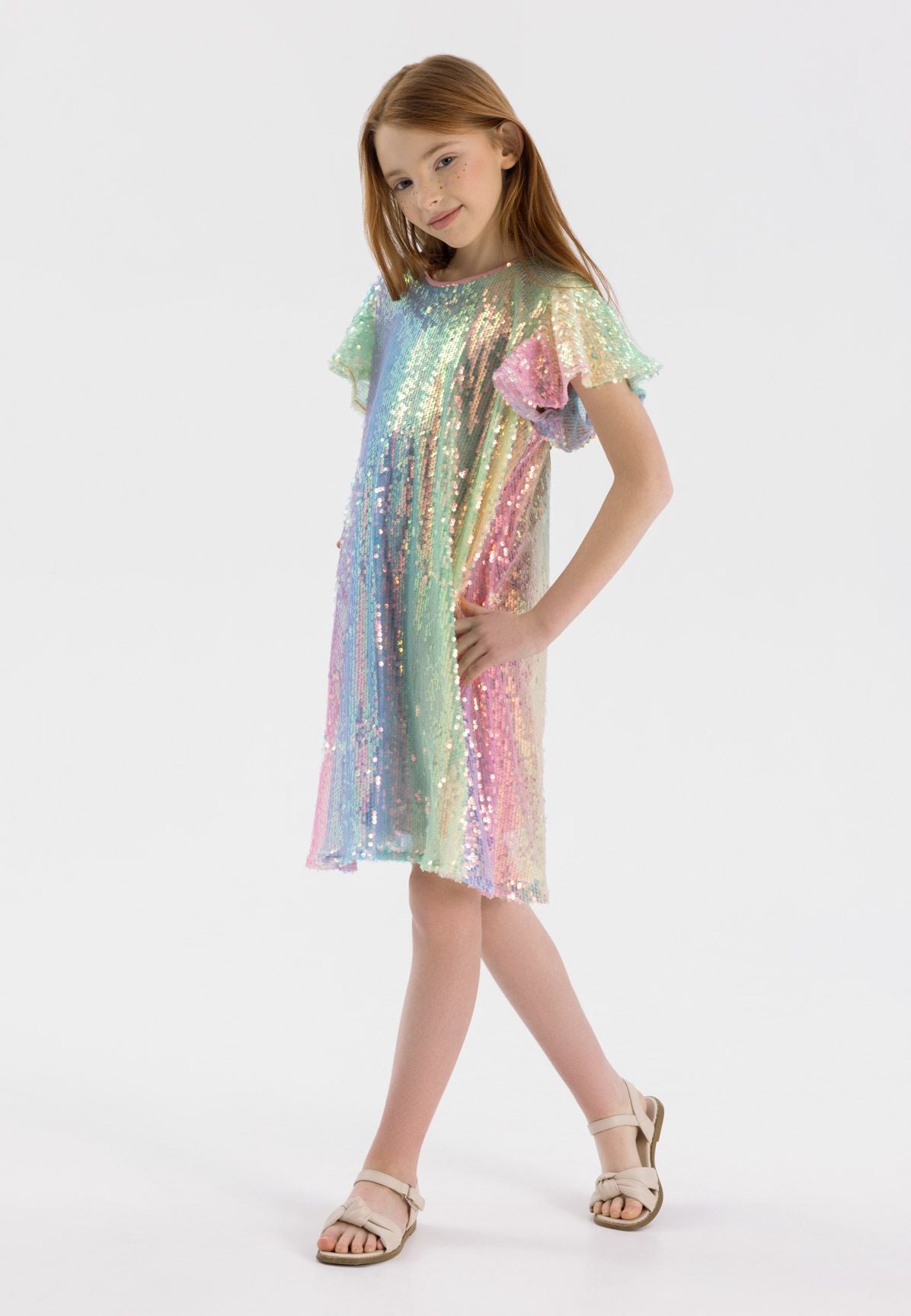 Pastel rainbow sequin shift dress, model front.