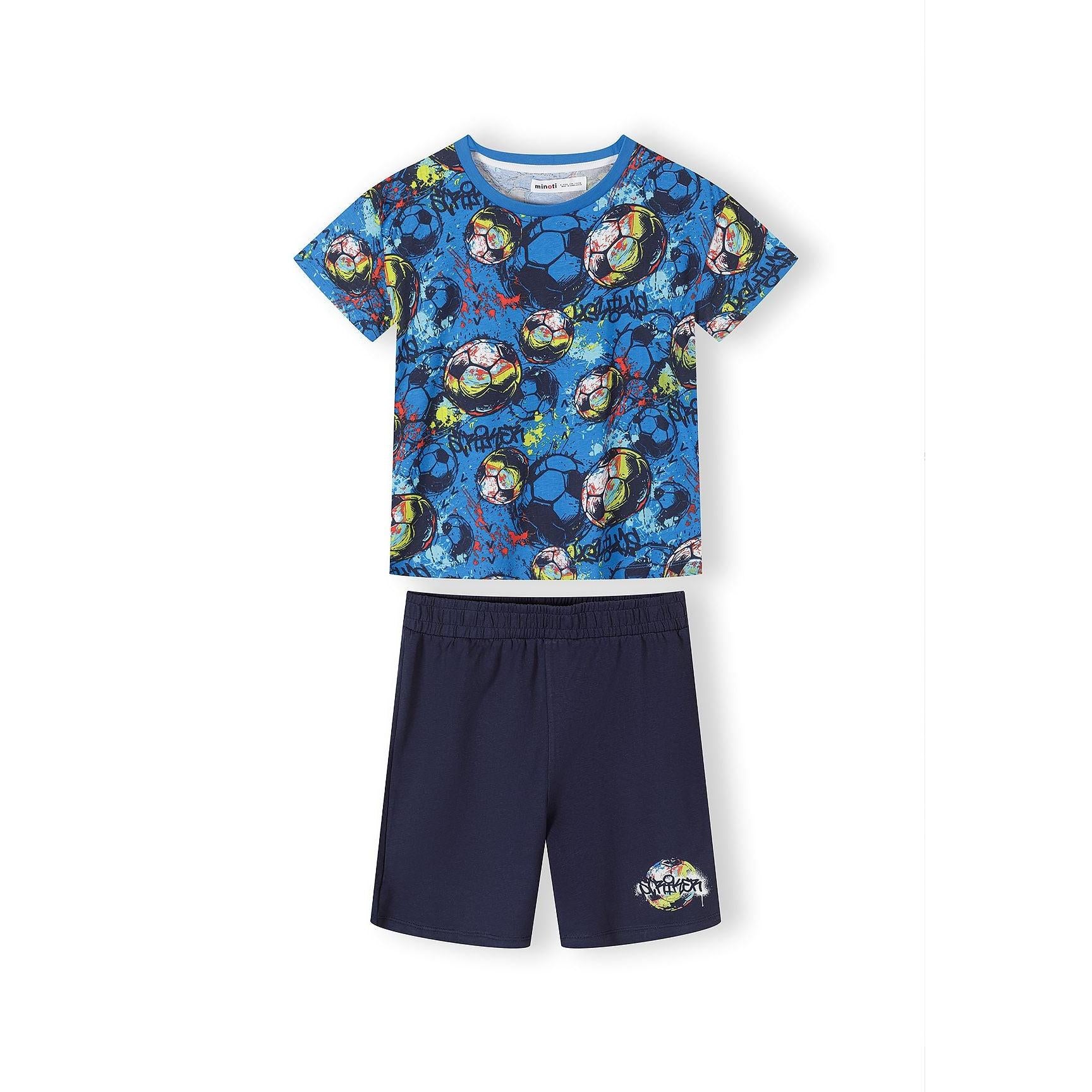 Blue football print t-shirt with navy shorts showing vibrant all-over soccer ball pattern with colorful graffiti-style design on white background