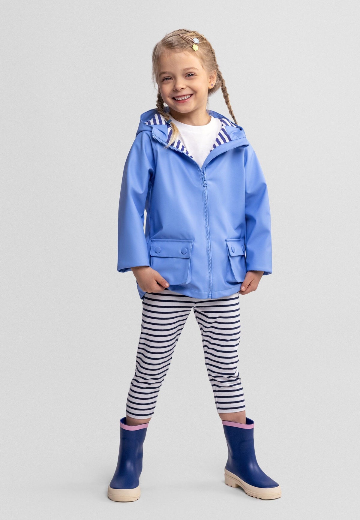 Girls' blue hooded jacket, shown worn.