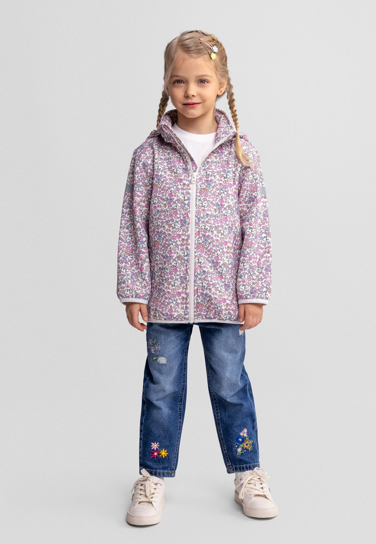 Girls' off-white hooded printed jacket, shown worn.