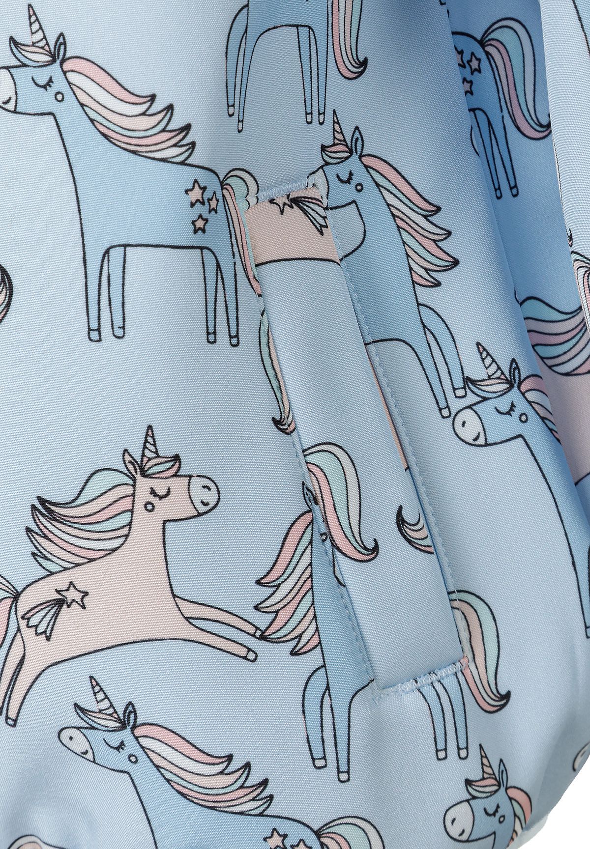 Detail of a light blue softshell jacket featuring unicorn prints and a front pocket.