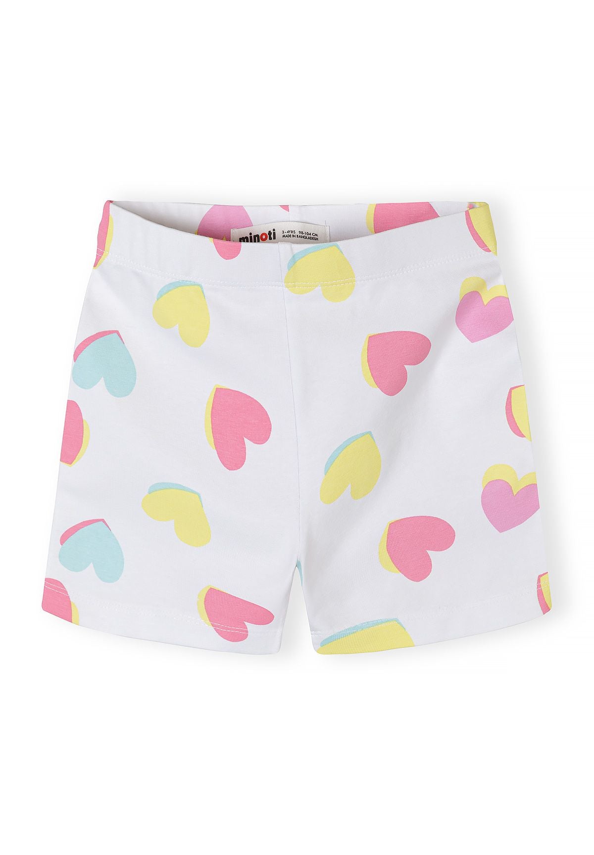 Detail of girls' cycle shorts in white with colorful heart prints and elasticated waistband.