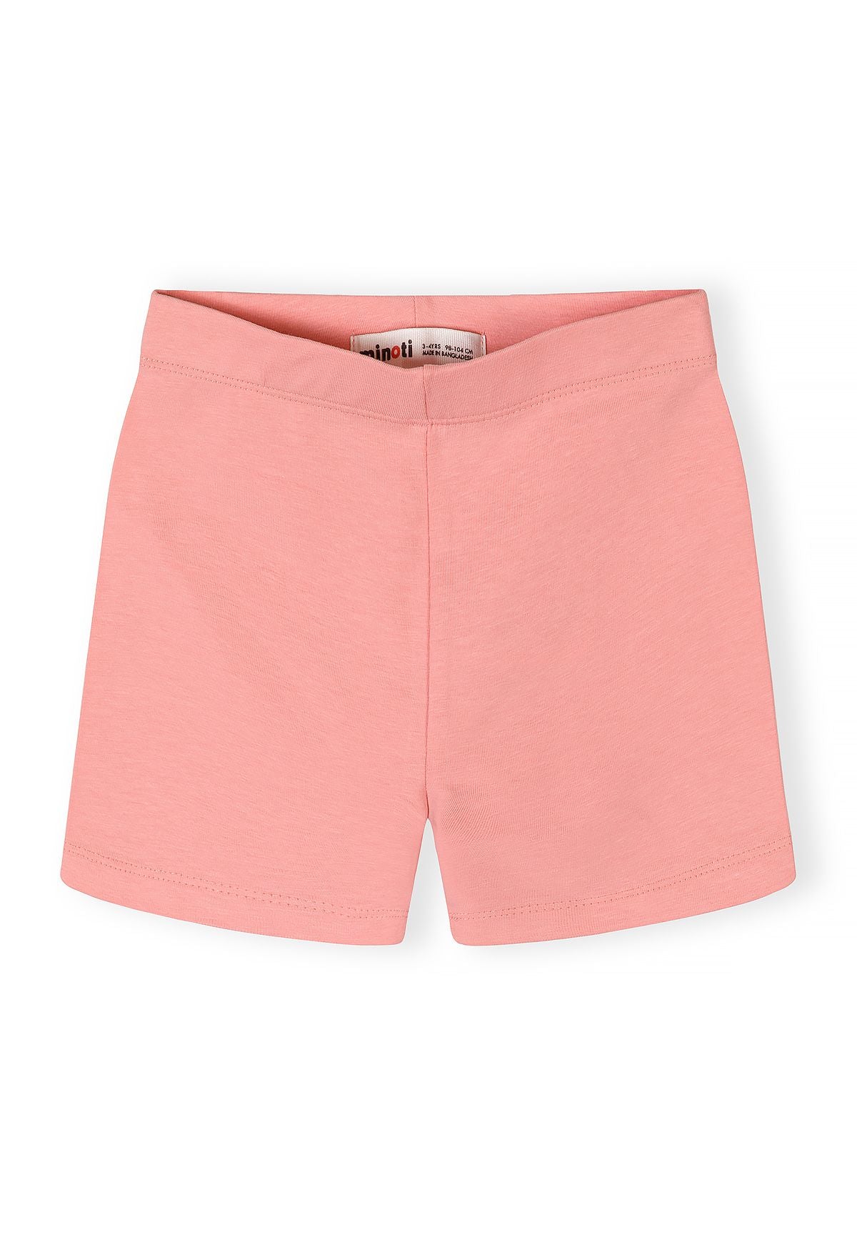Girls cotton stretch bike shorts in pastel pink, front view, elasticated waistband.