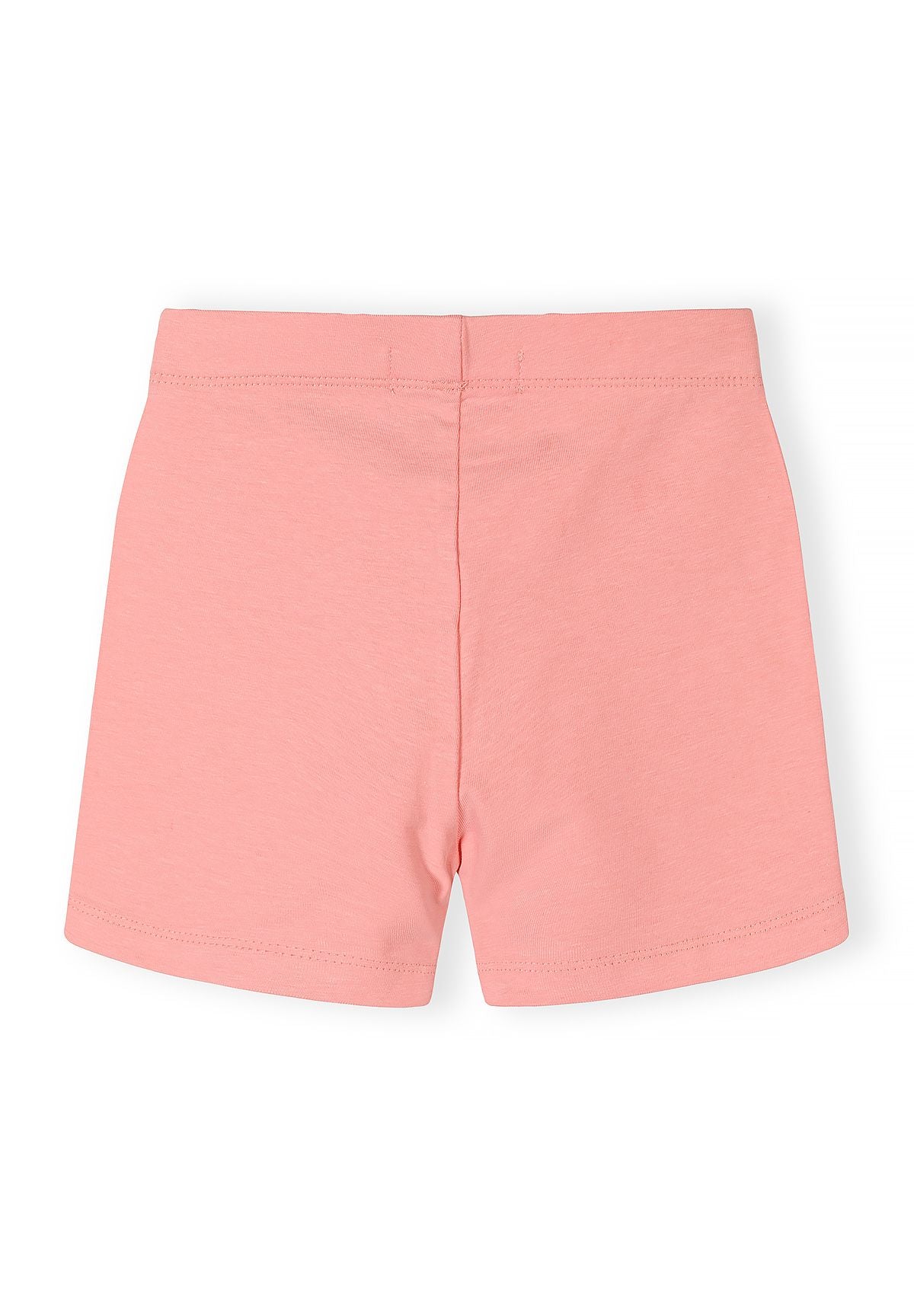 Girls bike shorts in pastel pink, back view, featuring a slim fit and elasticated waistband.