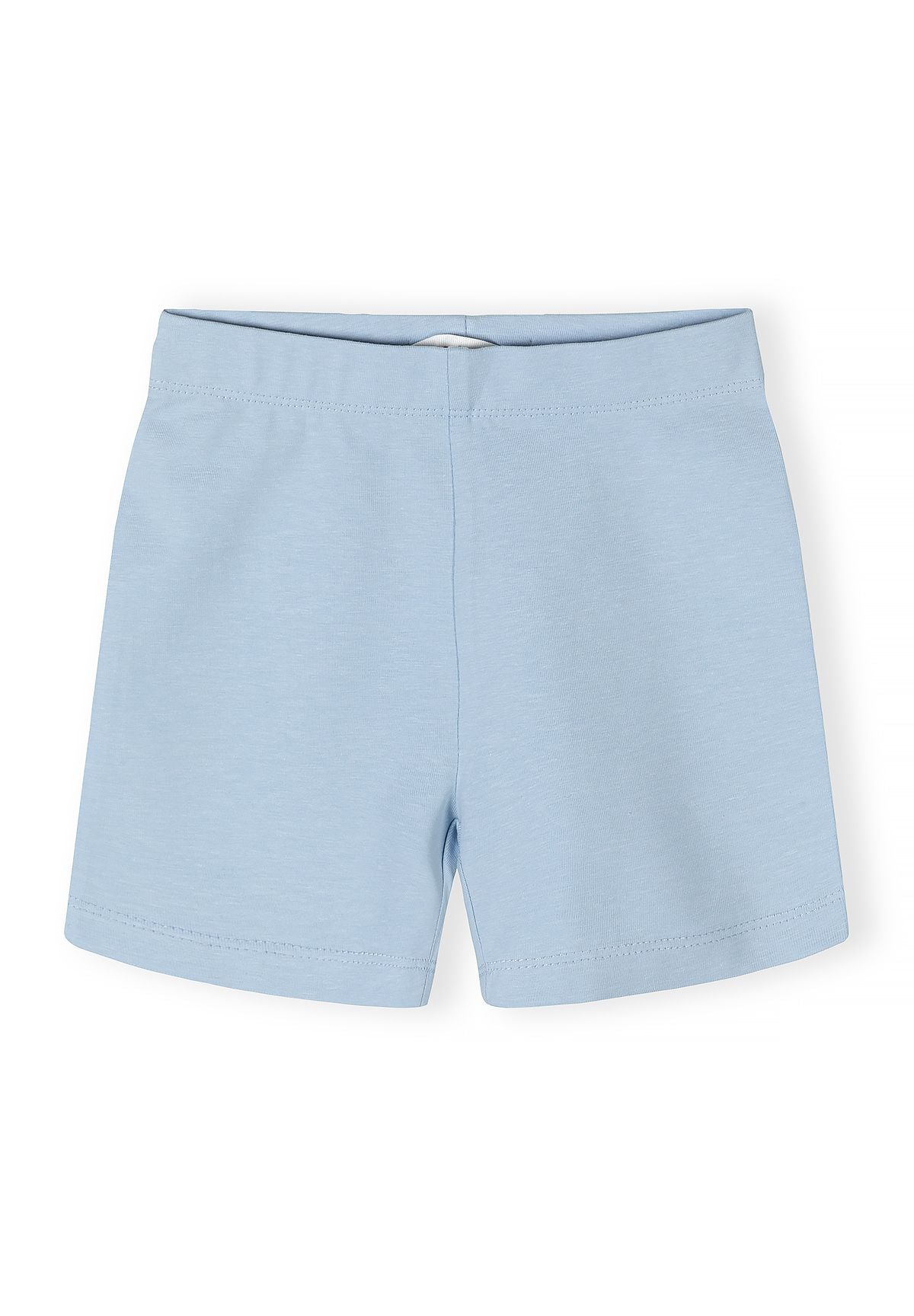 Detail of blue girls' bicycle shorts with elasticated waistband.