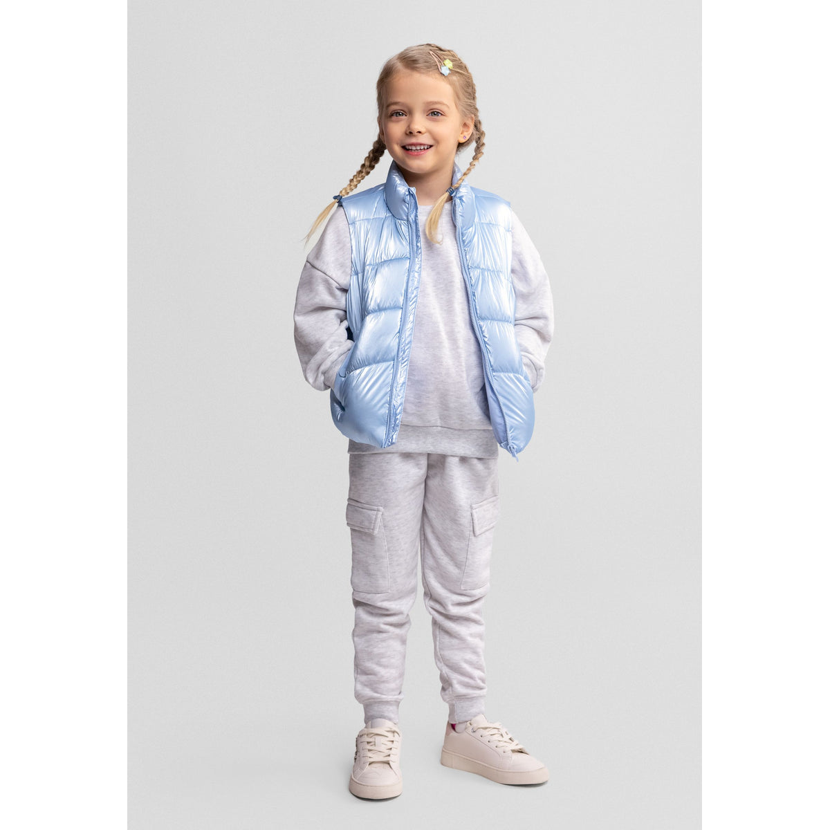 Girls' shiny padded gilet in light blue — complete product view for square Shop card