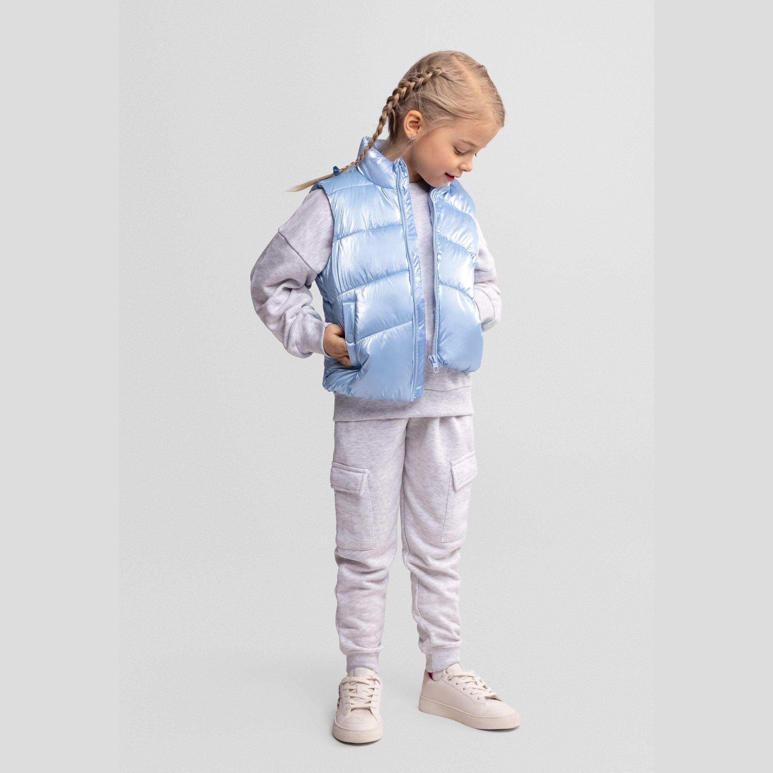 Front view of metallic blue quilted waistcoat with full zip closure, high collar and horizontal quilted pattern on white background