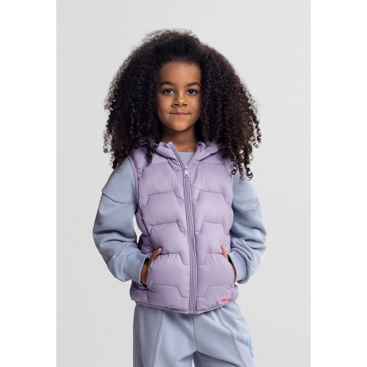 Girls' padded gilet in lilac — complete product view for square Shop card