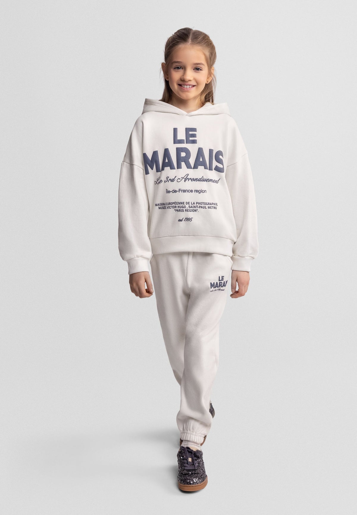 Cream hoodie and joggers set, full set worn front.