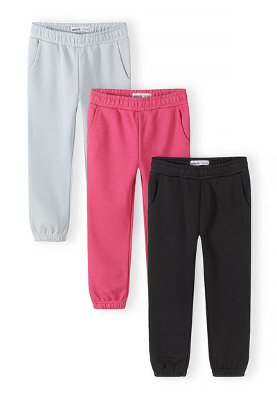 Light blue, pink and black joggers, three joggers front.