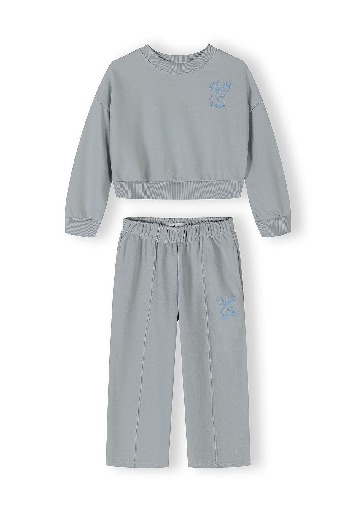 Light blue girls' tracksuit with hooded jacket and wide-leg trousers, front view.