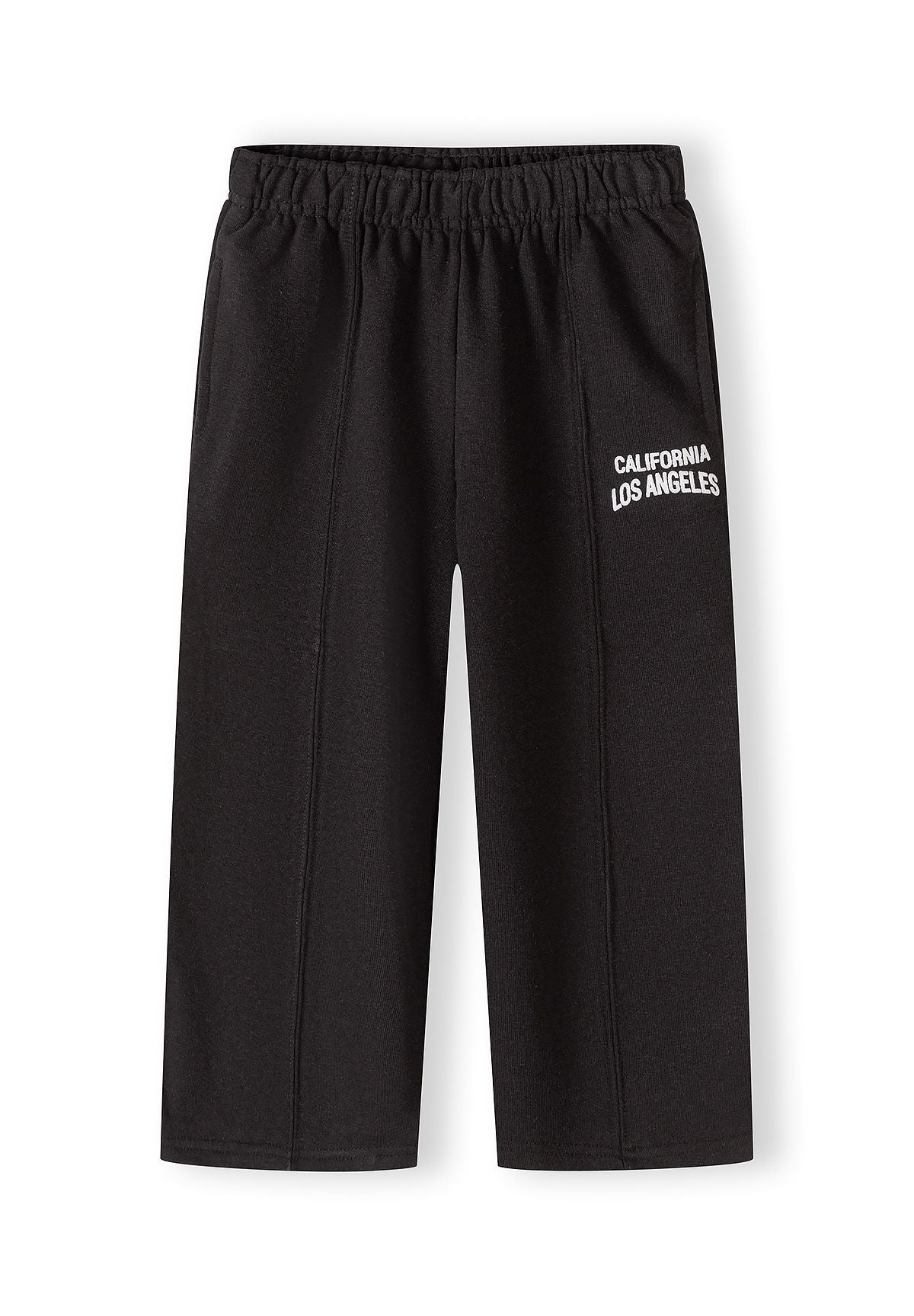 Black loose fit jogging trousers for girls, featuring an elastic waistband and logo detail.