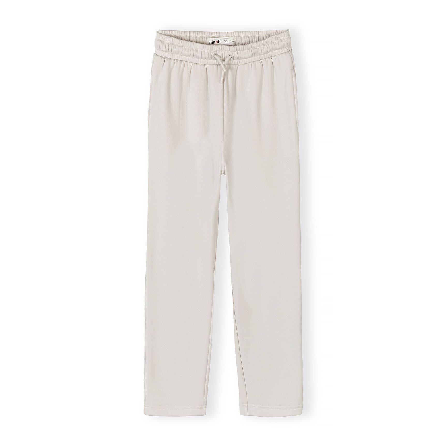 Flat lay of off-white wide leg joggers showing full length and silhouette on white background