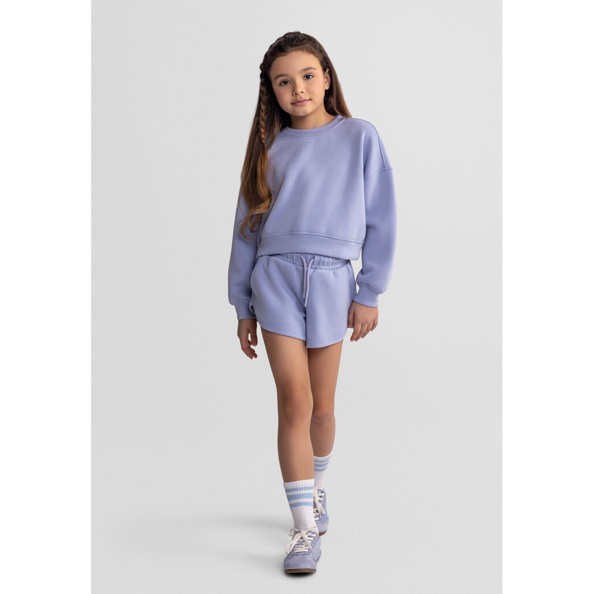 Women's sweatshirt and shorts set in light blue — complete product view for square Shop card
