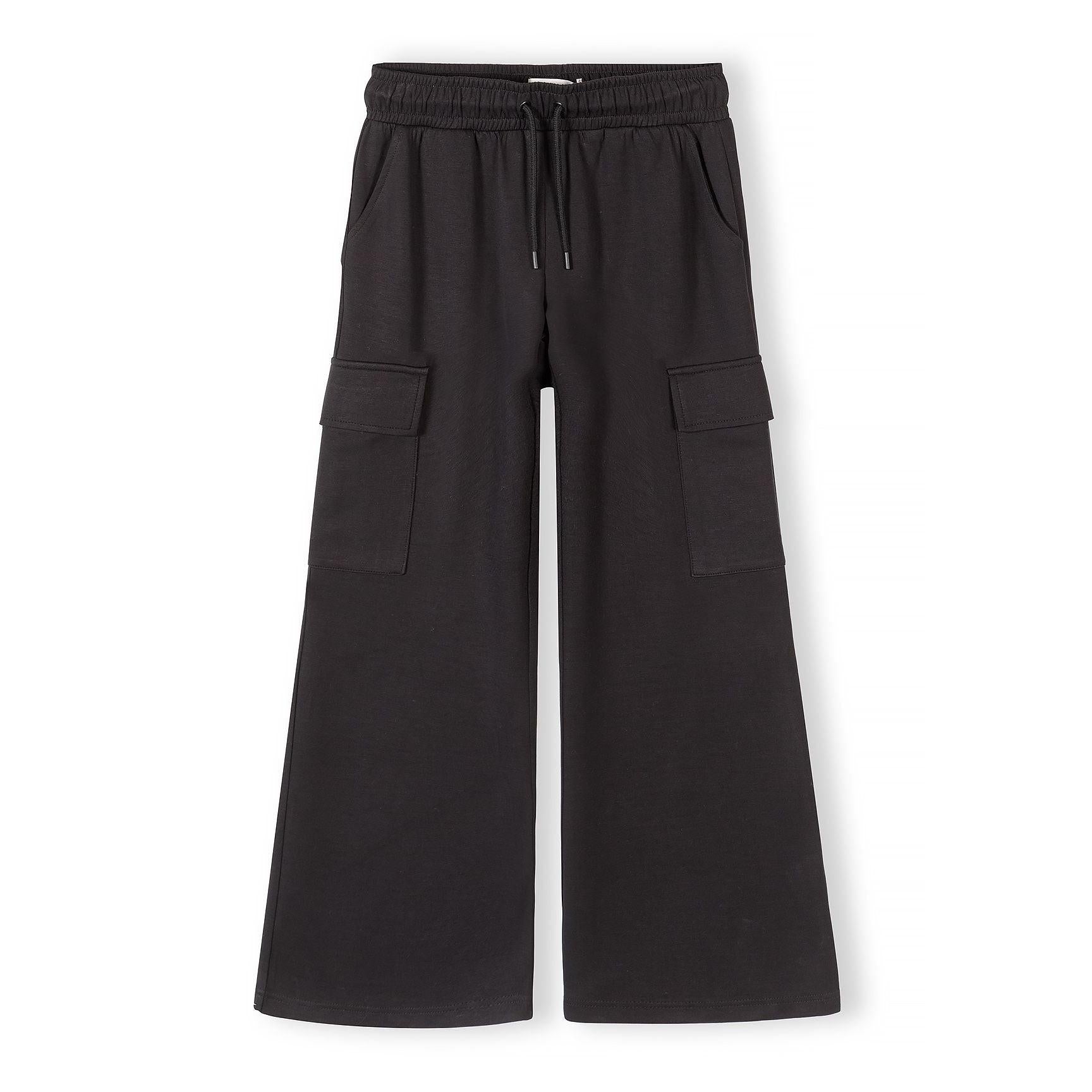 Black wide leg joggers with cargo pockets on white background, front view showing relaxed fit and drawstring waistband