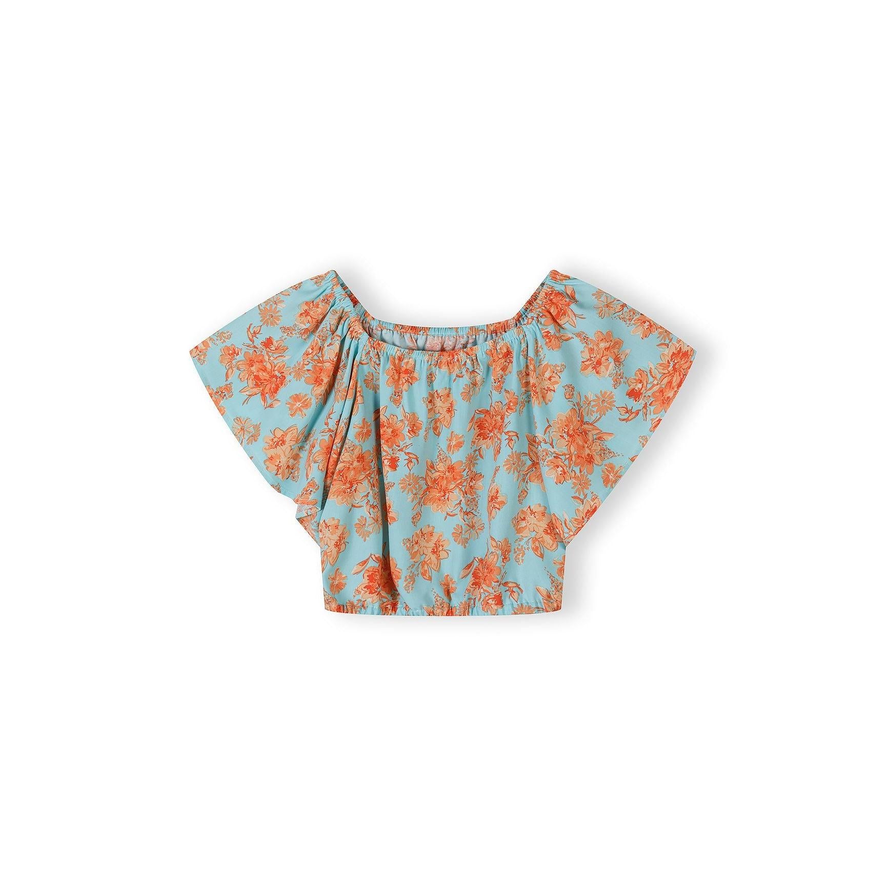 Light blue viscose top with orange floral pattern showing off-shoulder design and flutter sleeves, laid flat on white background