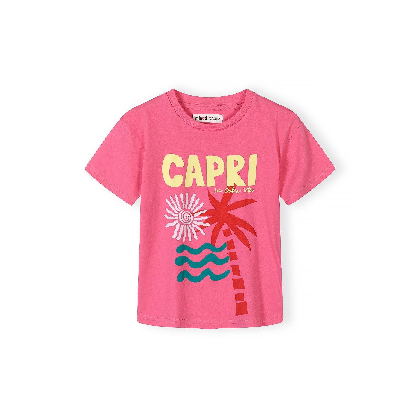 Close-up detail of pink t-shirt showing CAPRI text in yellow letters with 'la dolce vita' script and palm tree graphic with sun design