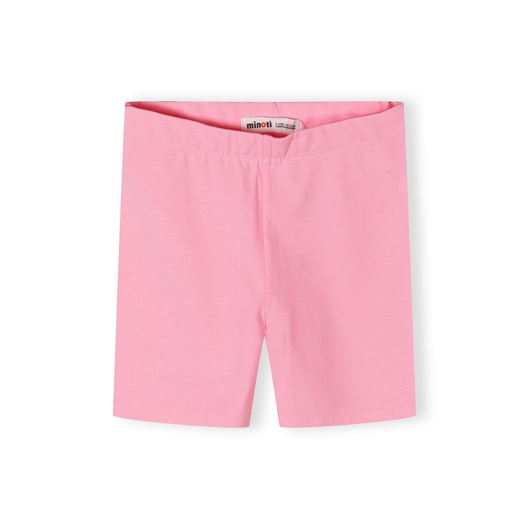Single pair of bright pink cycling shorts laid flat against white background showing smooth fabric texture and fitted silhouette