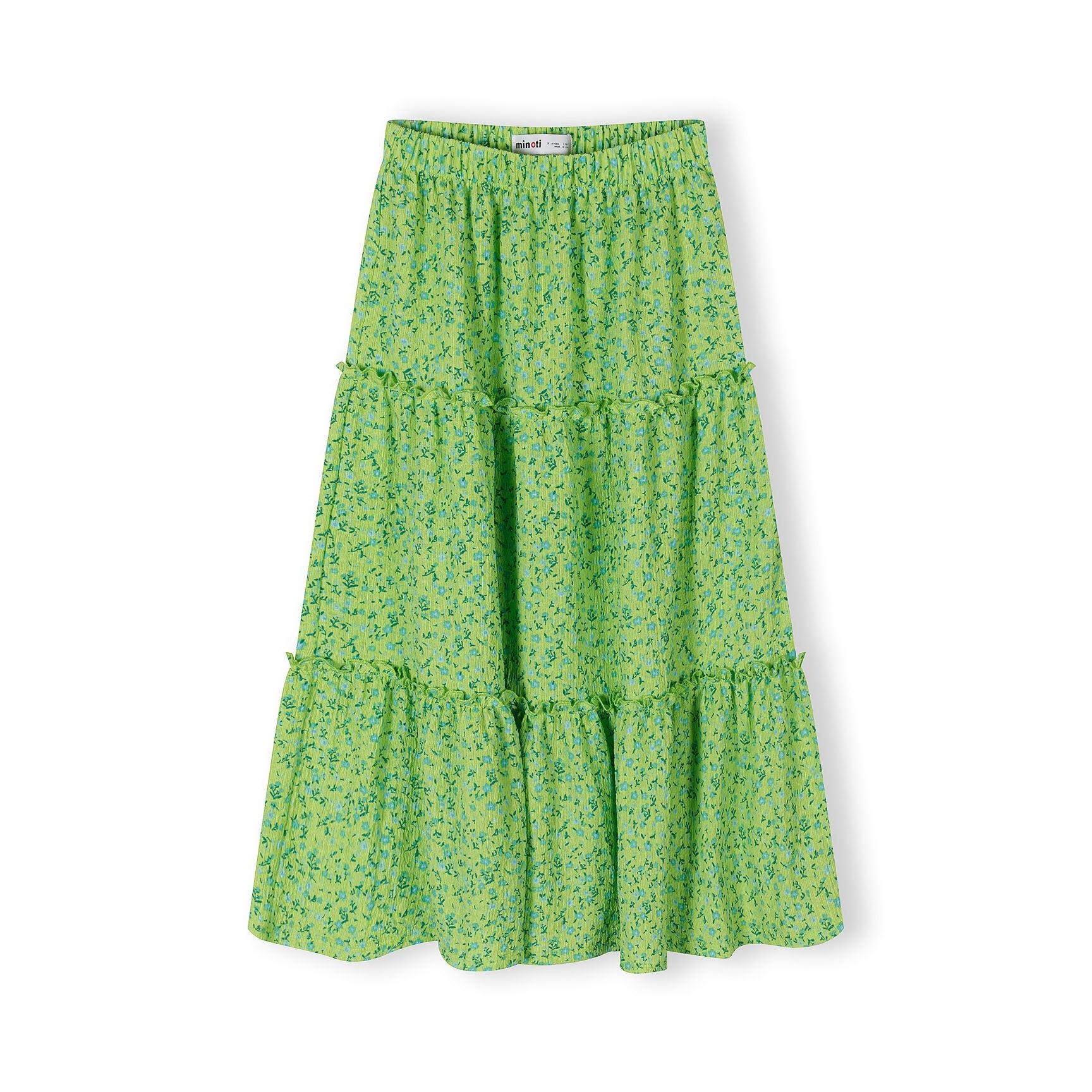 Green floral maxi skirt laid flat showing full length tiered design with elasticated waistband and delicate blue floral print