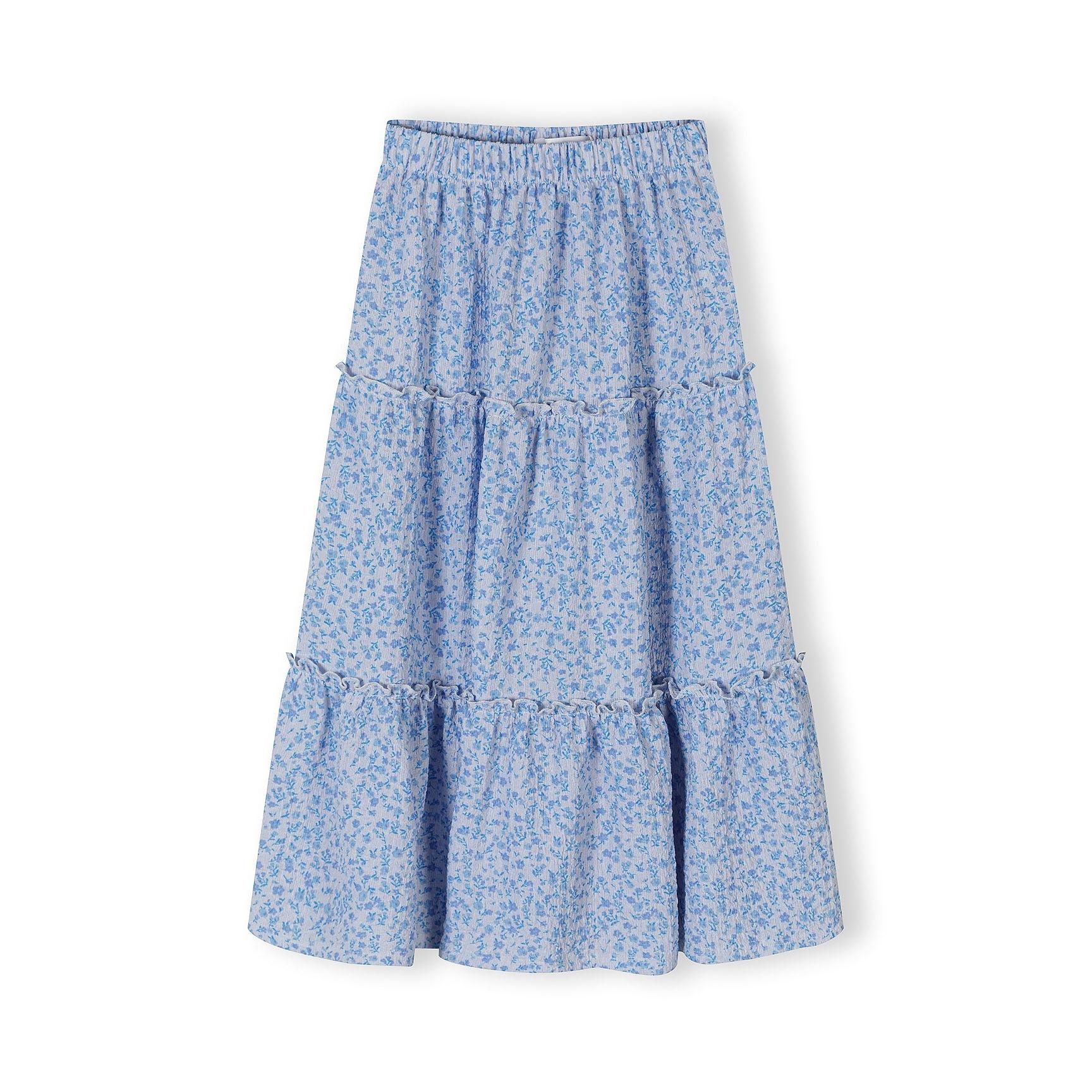 Blue floral tiered maxi skirt laid flat showing elasticated waistband and three-tier design on white background