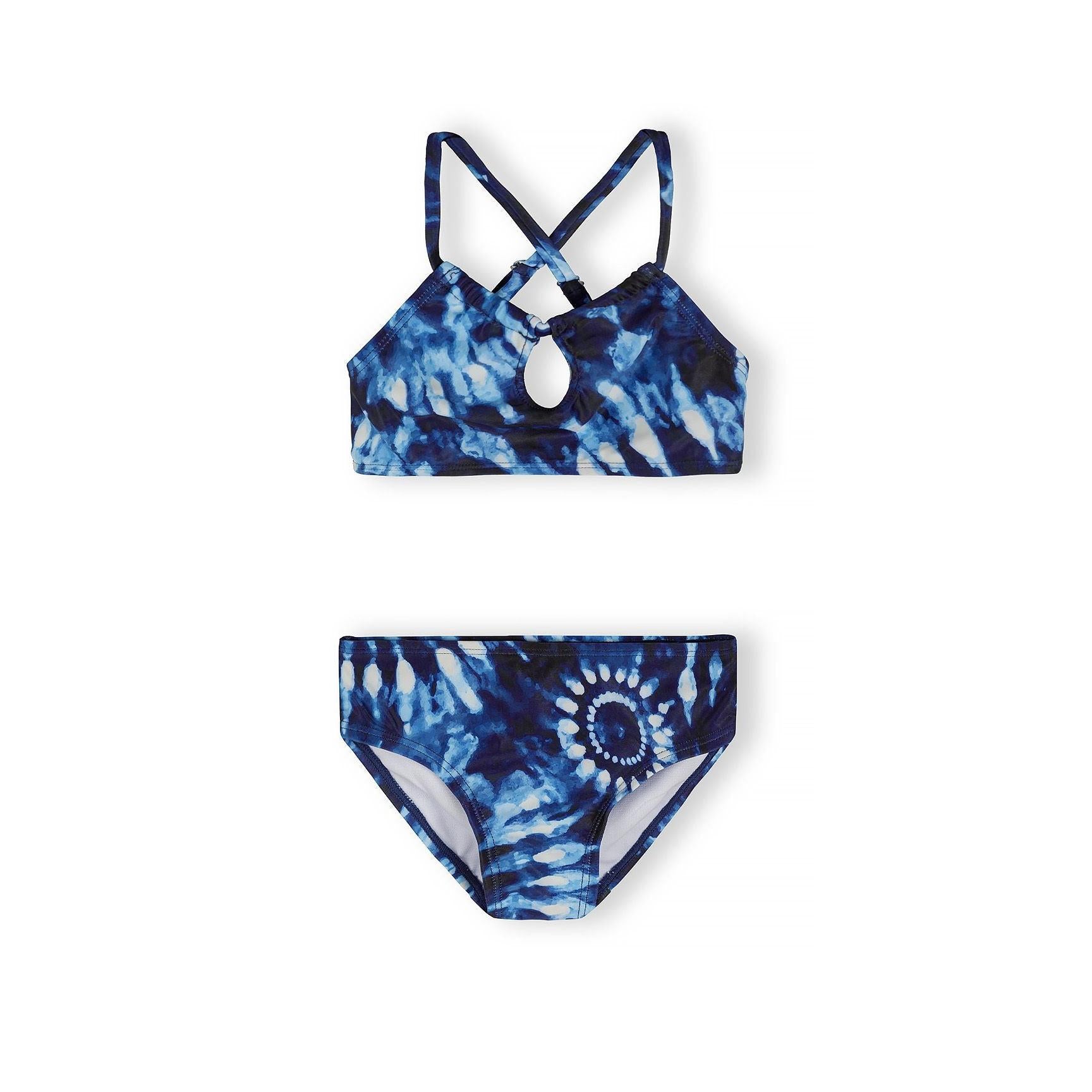 Detail view of blue tie-dye bikini top showing cross-back strappy design and tie-dye pattern in navy and light blue