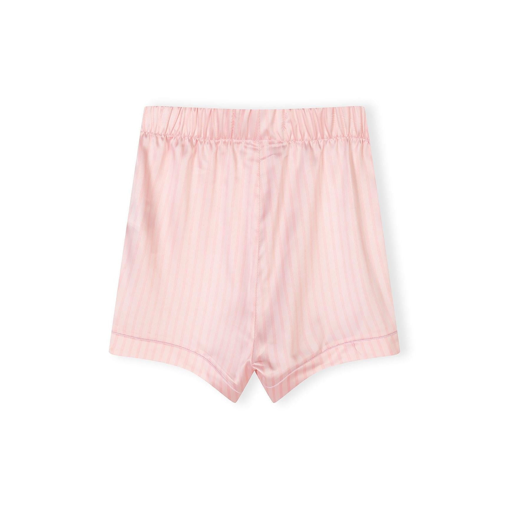 Close-up detail of pink and white striped satin pyjama top showing button front, lapel collar, chest pocket and Minoti label