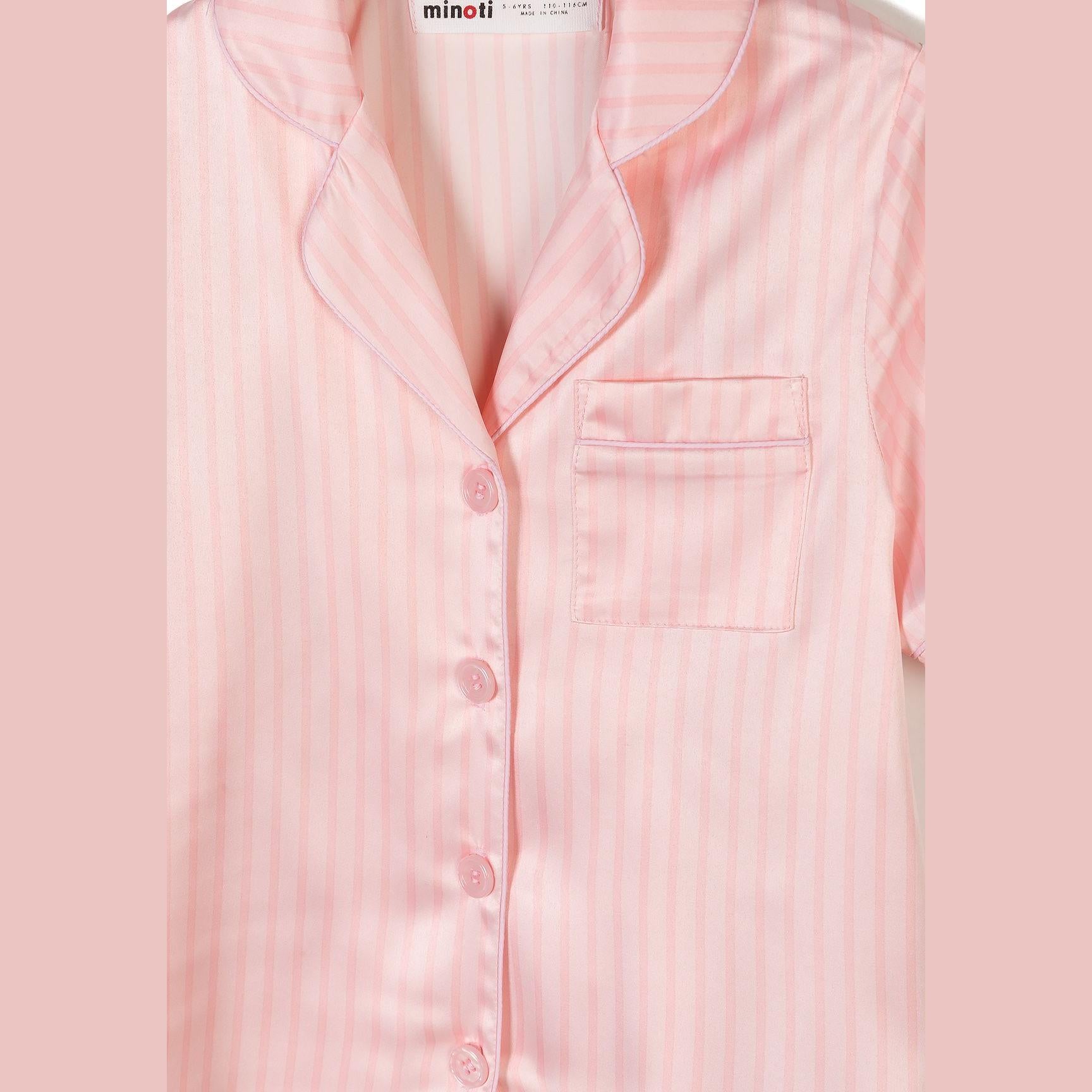 Close-up detail of pink and white striped satin pyjama top showing button front, lapel collar, chest pocket and Minoti label