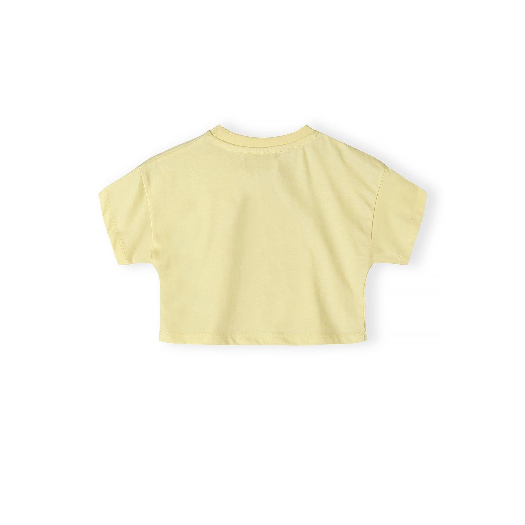 Back view of pale yellow cotton t-shirt showing plain design and short sleeves on white background
