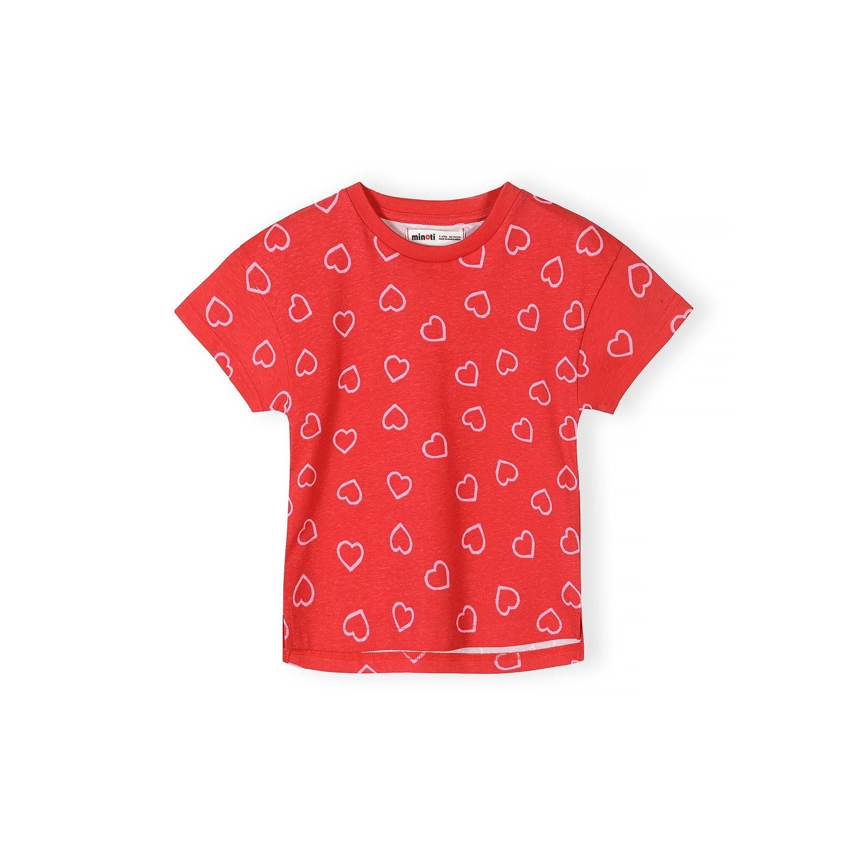 Detail shot of coral red t-shirt featuring white heart outline pattern scattered across the fabric with Minoti label at neckline
